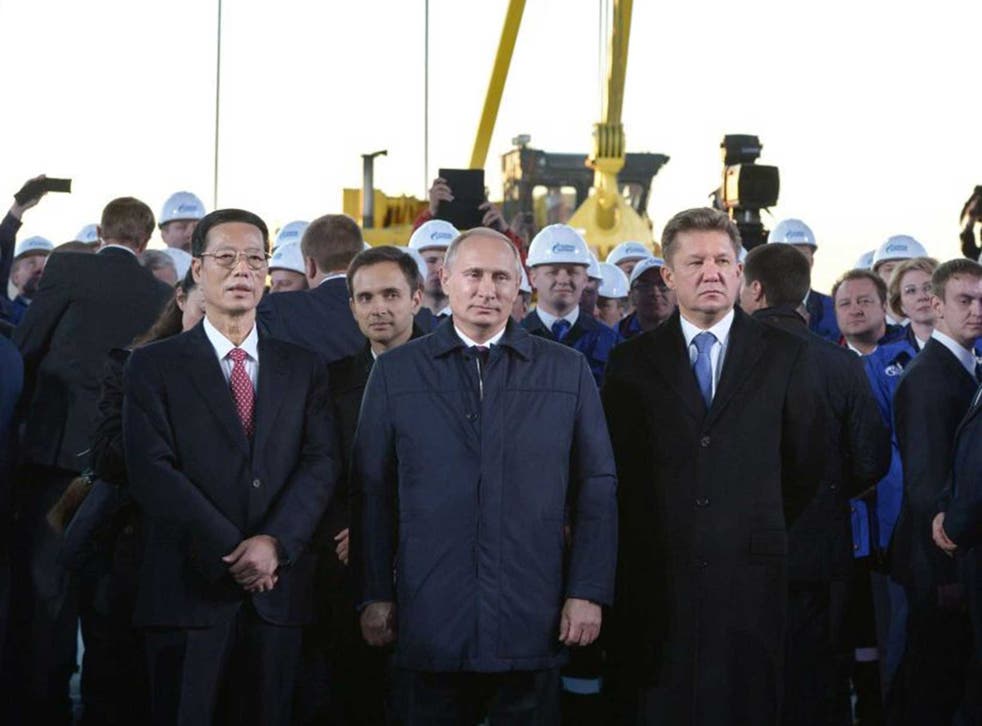 From left to right: Chinese vice-premier Gaoli, Russian president Putin and Gazprom CEO Alexei Miller
