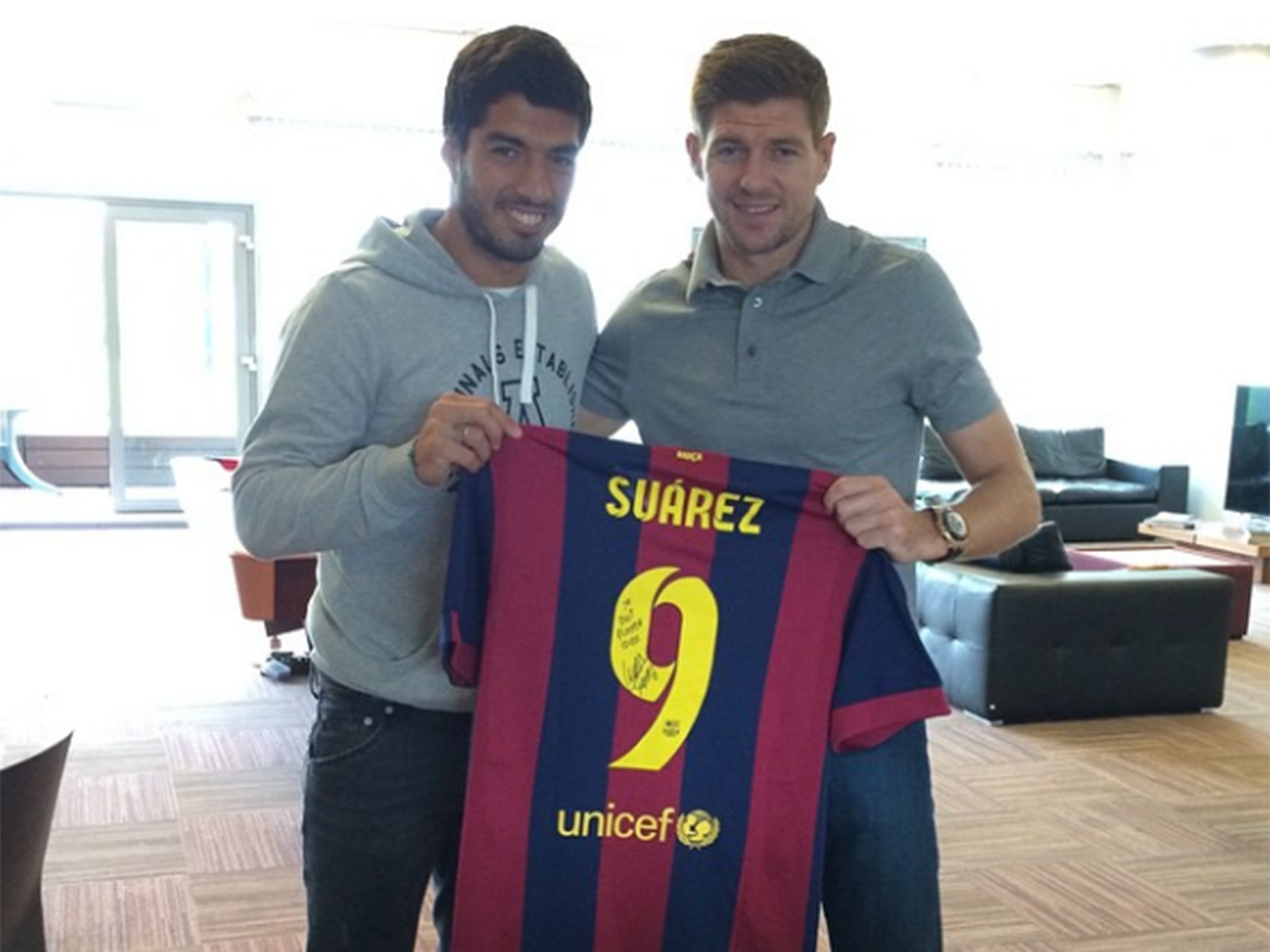 Luis Suarez together with Steven Gerrard
