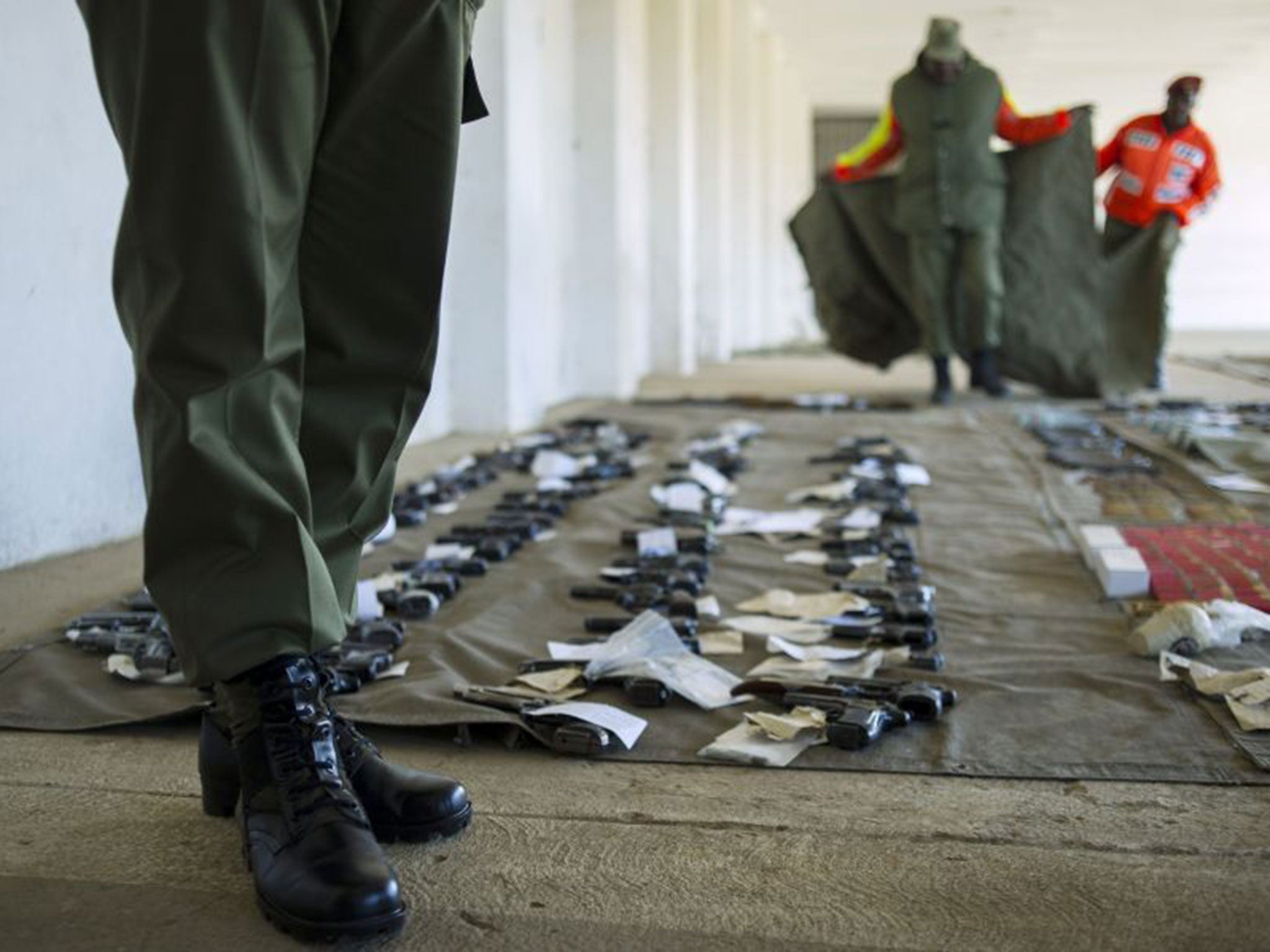 Soldiers confiscated firearms and explosives after the military raided police installations