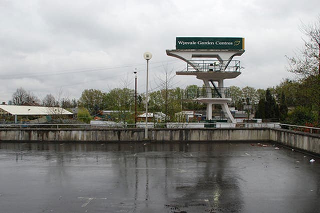 The multi-level concrete diving stage now stands in a garden centre 