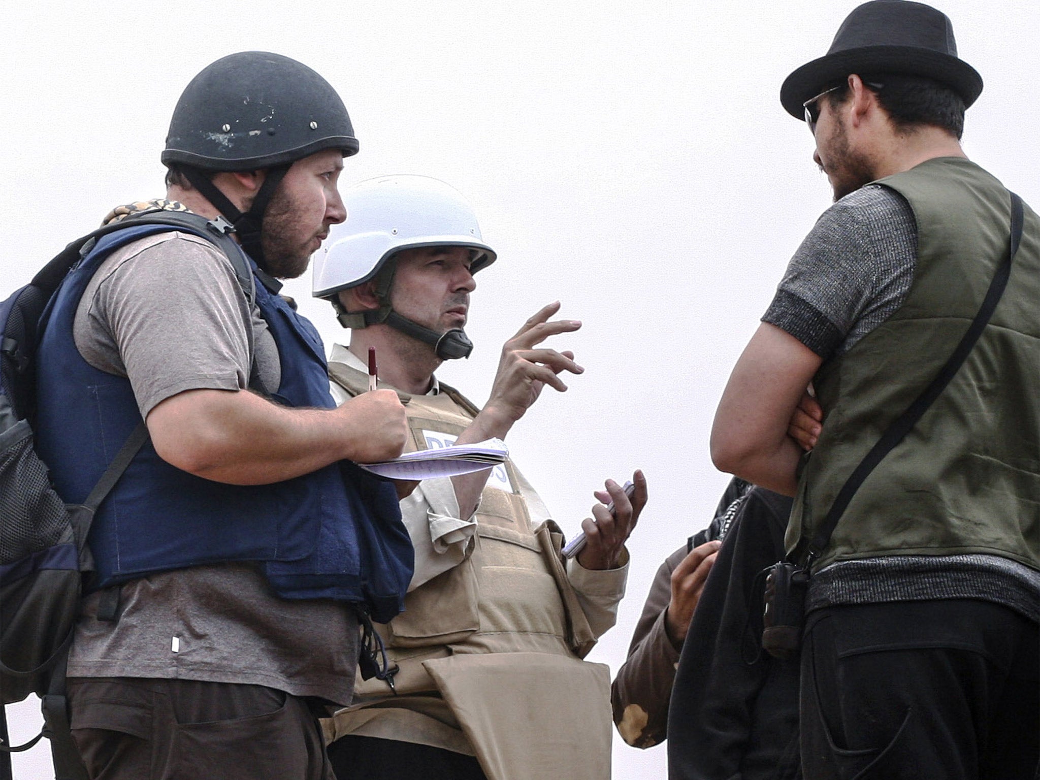 Journalist Steven Sotloff, left, pictured in Libya in 2011