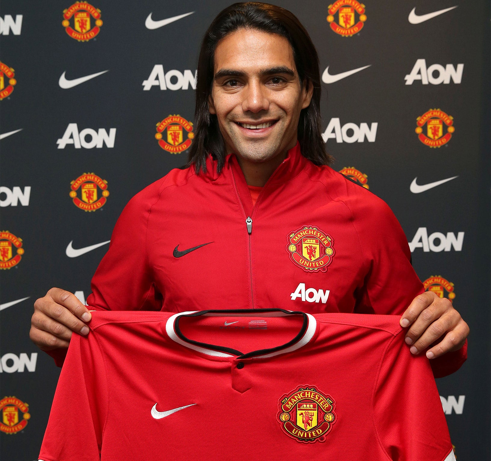 Radamel Falcao poses with his United shirt