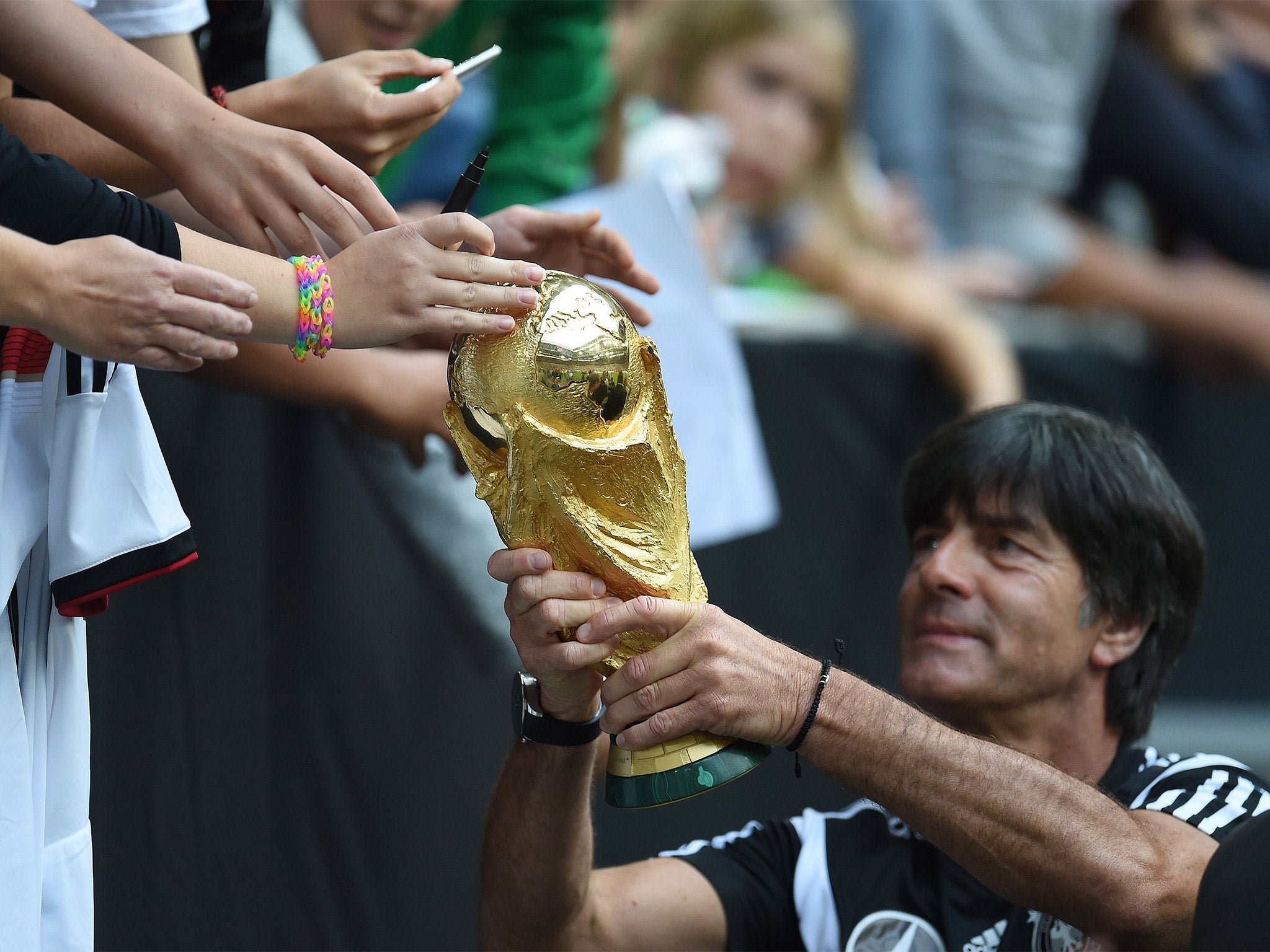 45,000 fans turned out for open training and a glimpse of the World Cup trophy, held by Germany coach Joachim Löw, ahead of his side’s sell-out friendly match against Argentina – a repeat of the final in Brazil this summer