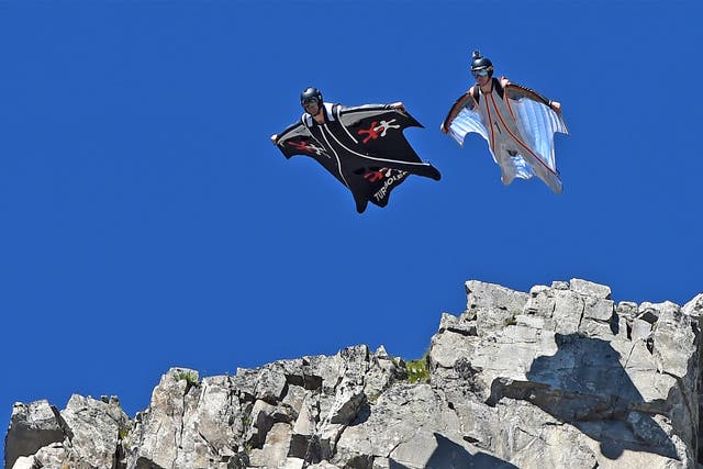 Two men jump from the top of the Brevent mountain to fly in wingsuit over the French ski resort of Chamonix, earlier this year