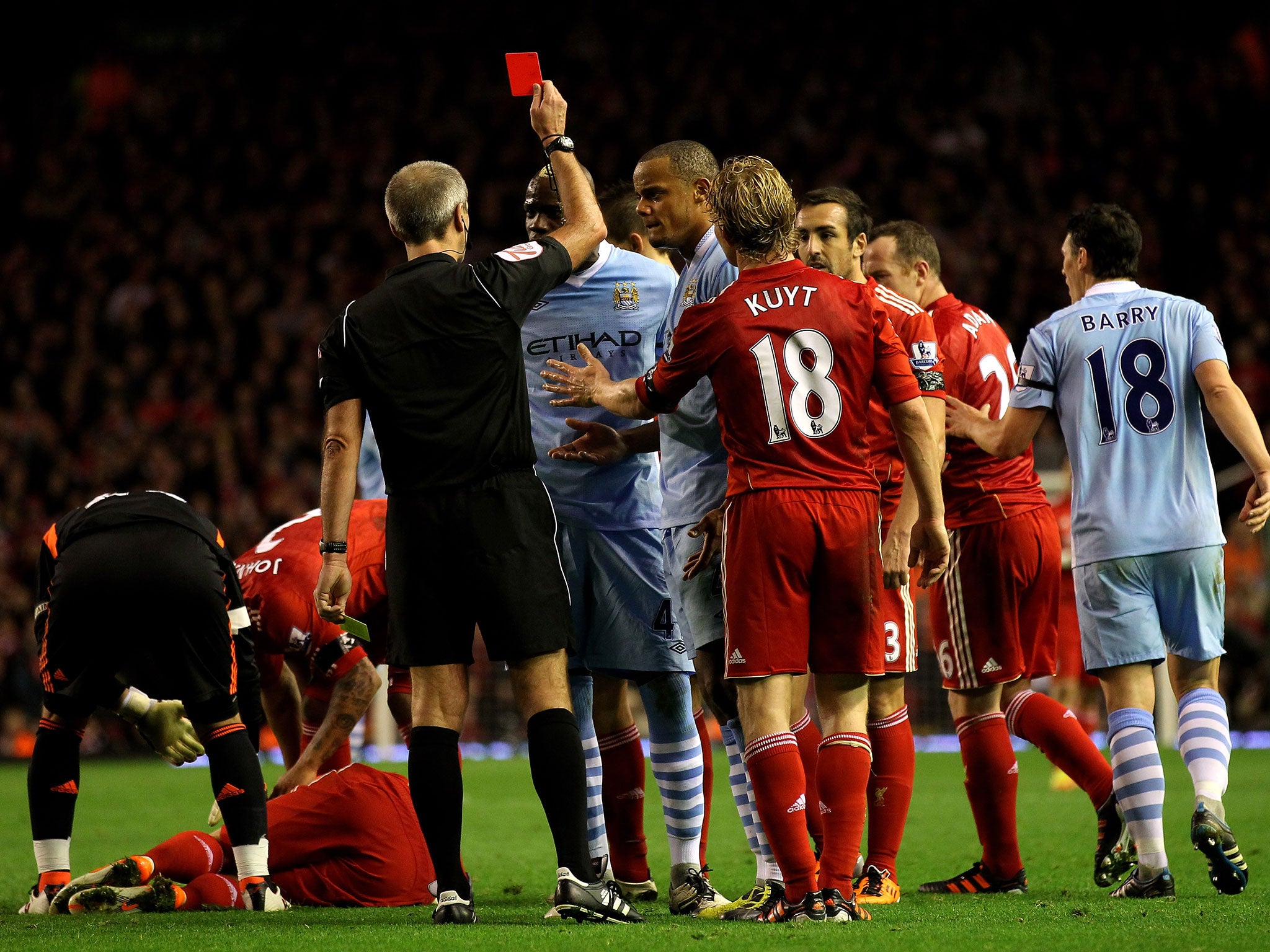 Balotelli receives his red card at Anfield in November 2011