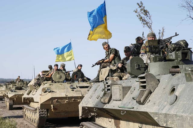 <p>Ukrainian soldiers near the city of Slaviansk as fighting continued in eastern Ukraine</p>