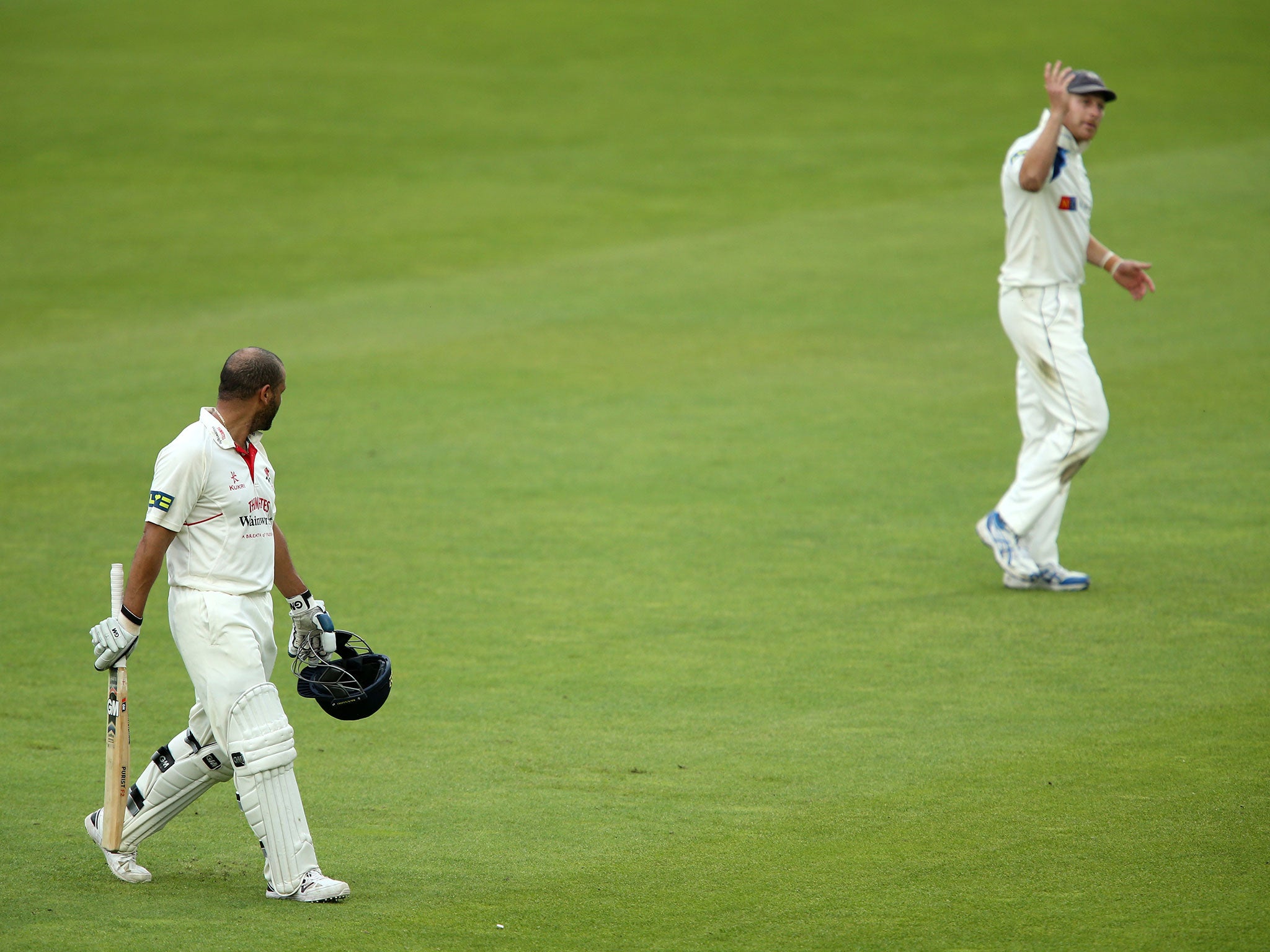 Ashwell Prince of Lancashire and Andrew Gale of Yorkshire have words as they leave the field