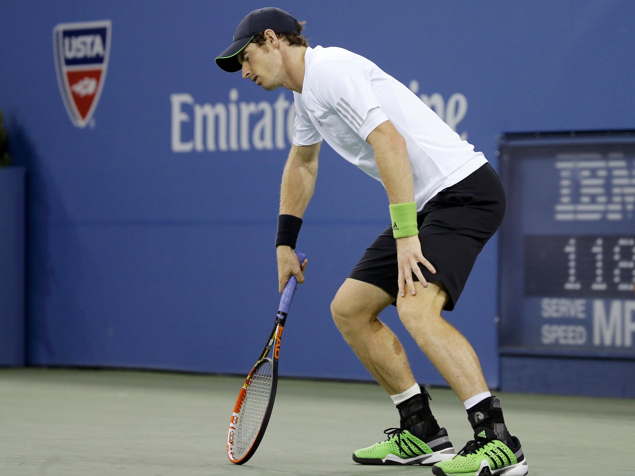 Andy Murray shows the strain during his US Open quarter-final defeat to Novak Djokovic