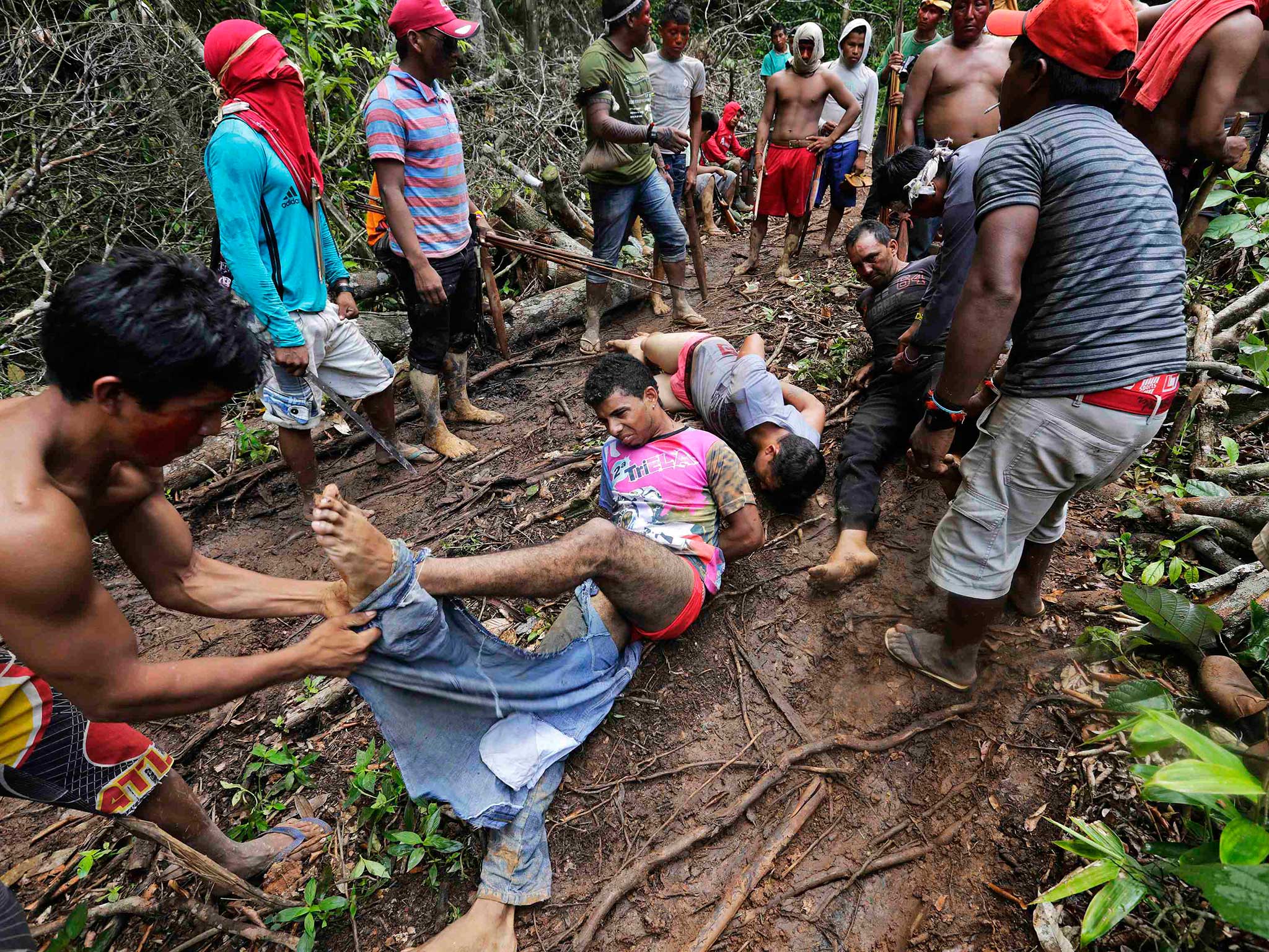 Photographs Show Amazonian Tribe Capturing And Stripping Illegal Rainforest Loggers The