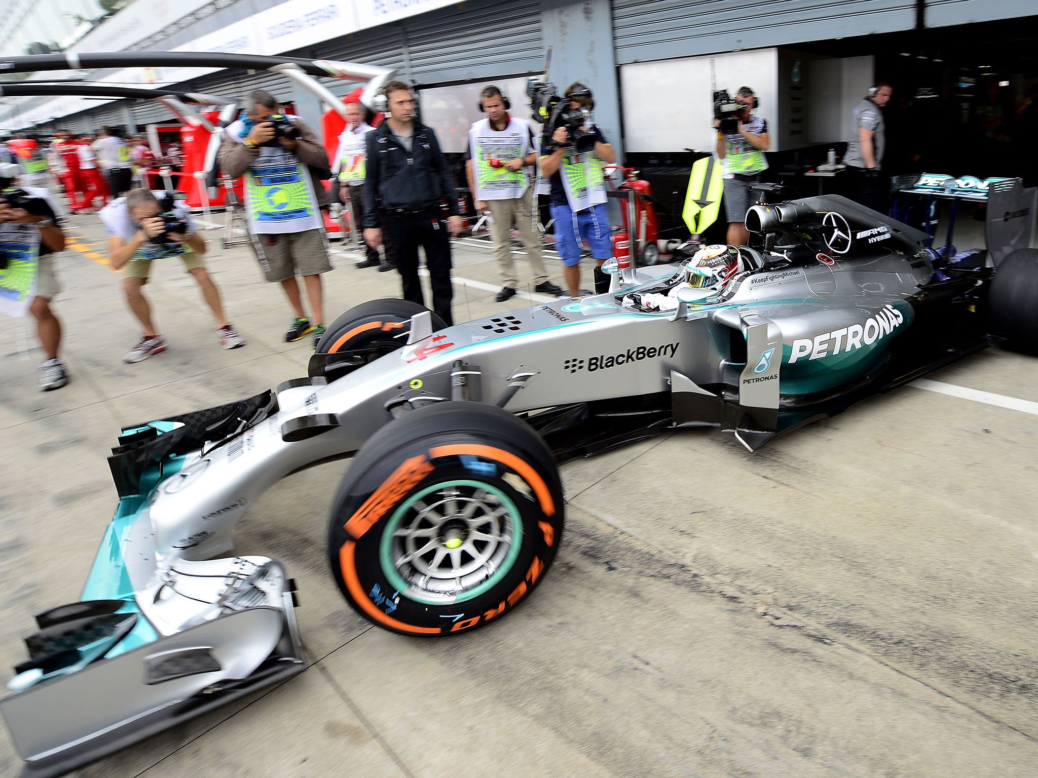 Hamilton emerges from his garage to begin first practice