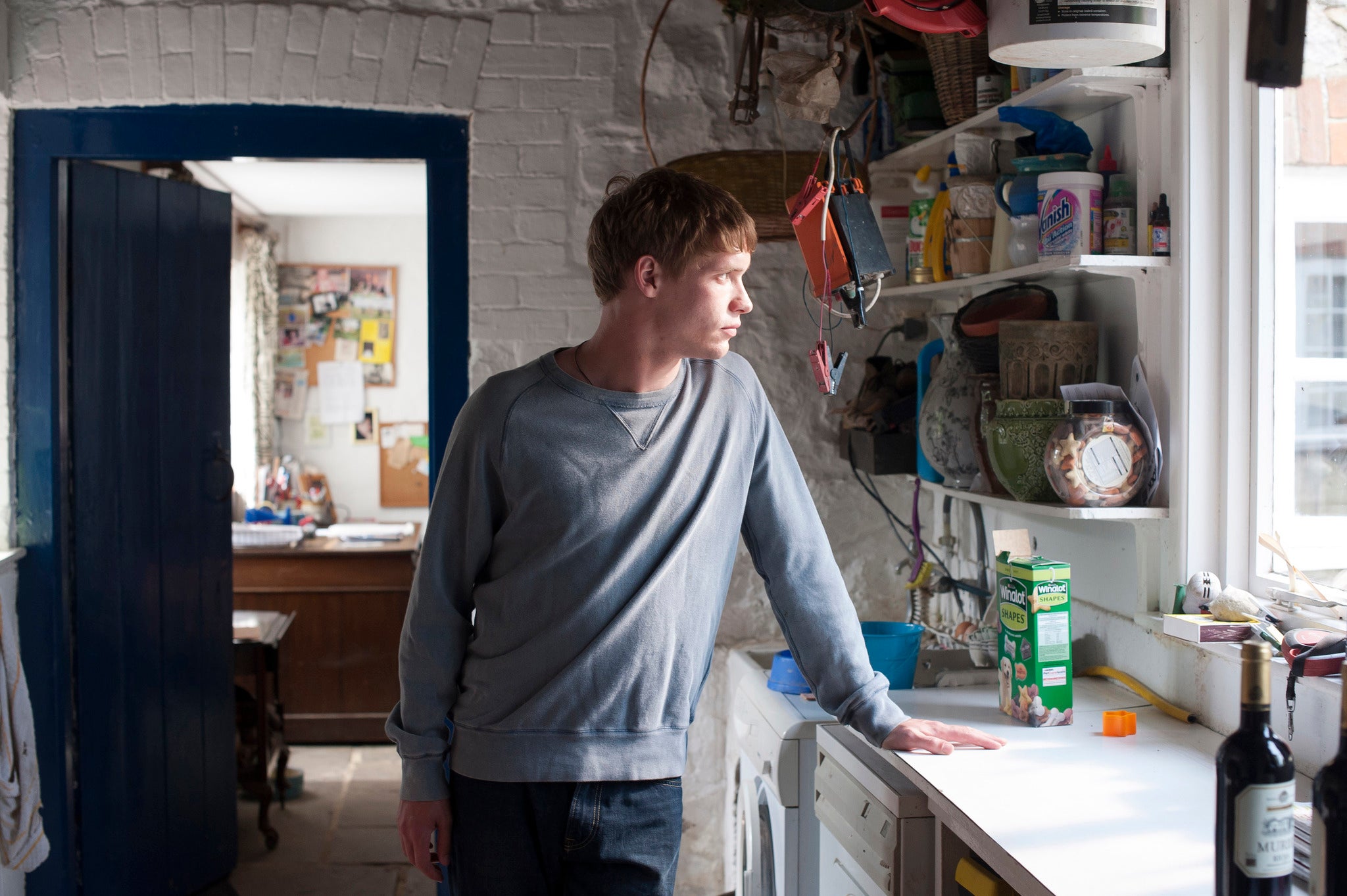 James (Billy Howle), ponders in the kitchen in new TV series Glue (Credit Garry Maclennan)