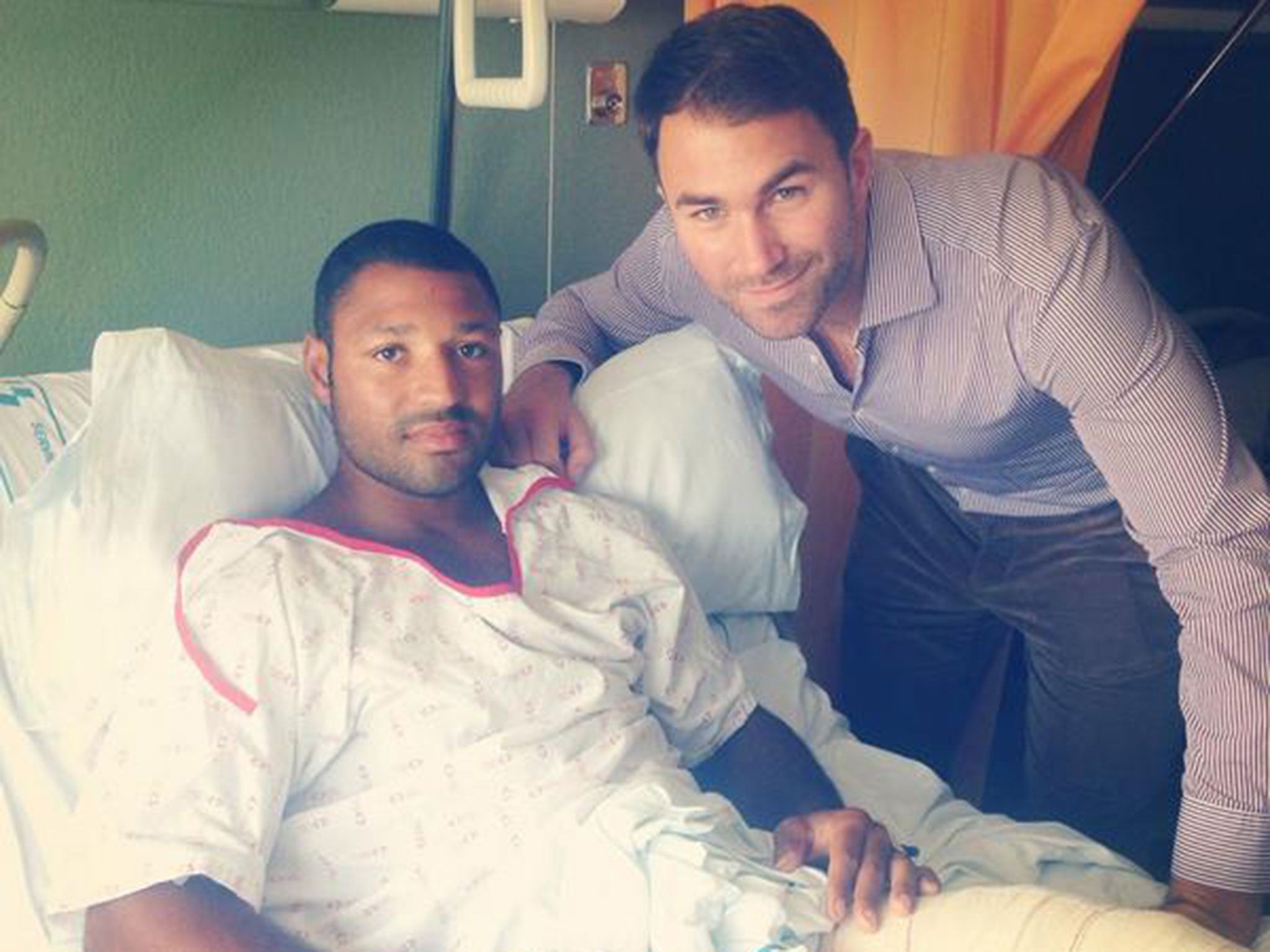 Eddie Hearn posted a picture alongside Kell Brook as the IBF world champion recovers from being stabbed in the leg