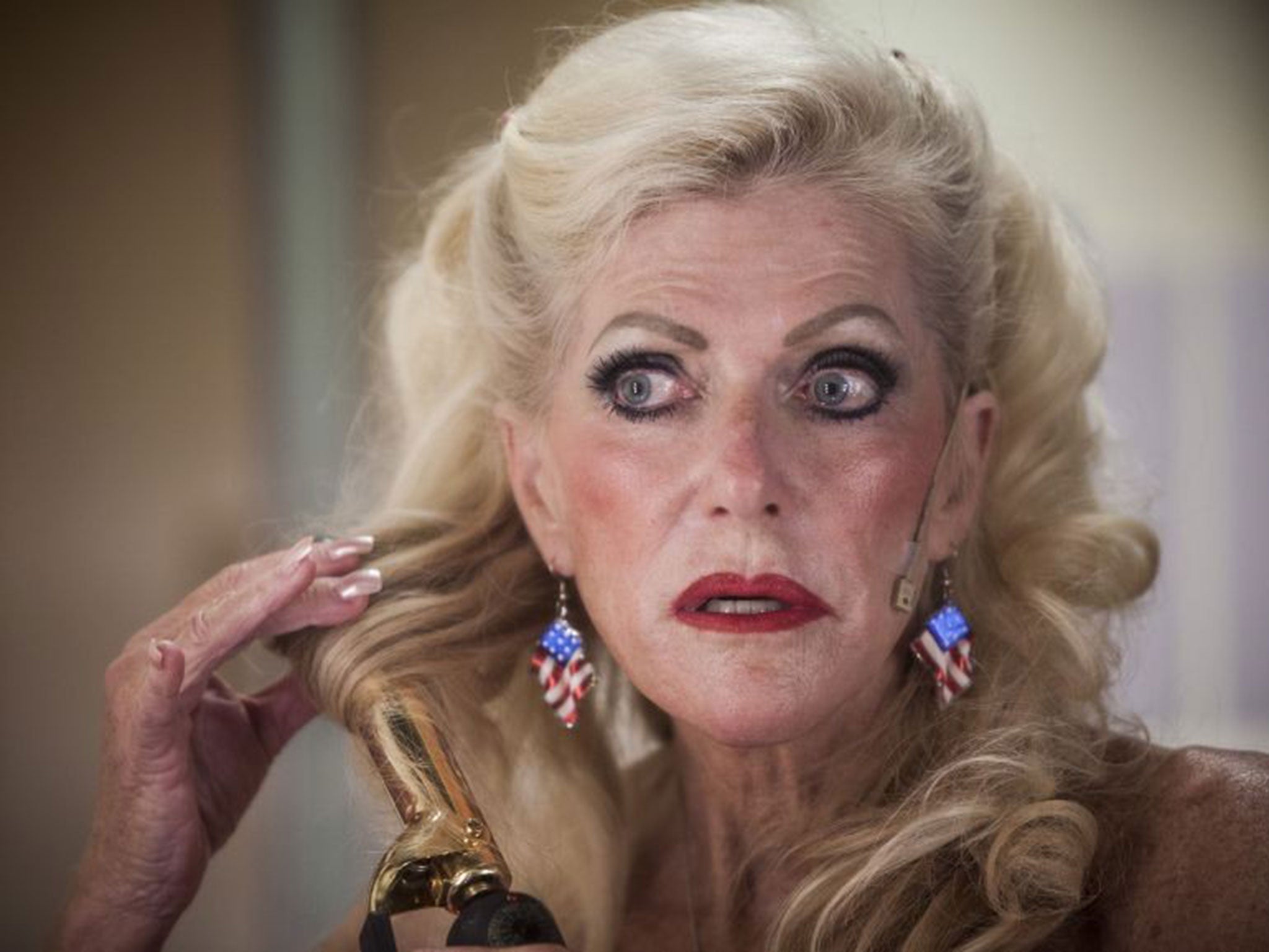 Winner of the Ms. Senior California of America 2014 State Pageant, Dr. Gayla Jackson, from Moorpark, CA., preps backstage before the talent portion of the competition