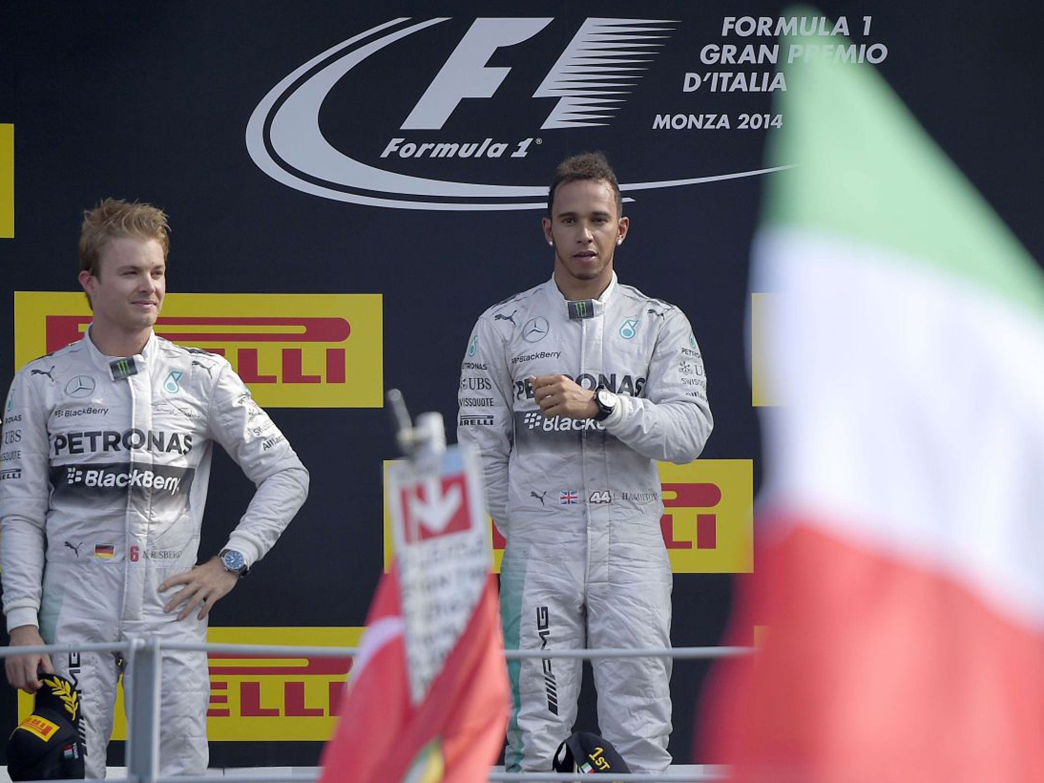 Lewis Hamilton (right) stands victorious on the podium ahead of second-placed Nico Rosberg