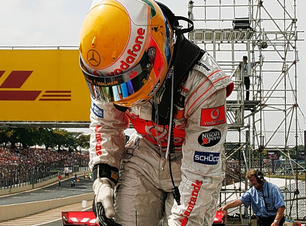 Lewis Hamilton shows his dismay after getting out of his mysteriously stricken car at the 2007 Brazilian Grand Prix