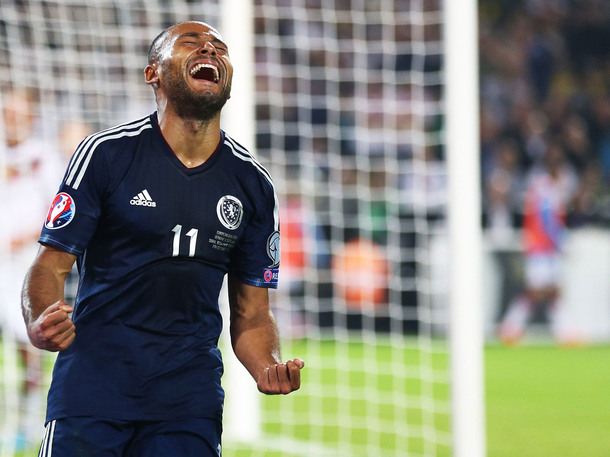 Ikechi Anya celebrates after equalising against world champions Germany