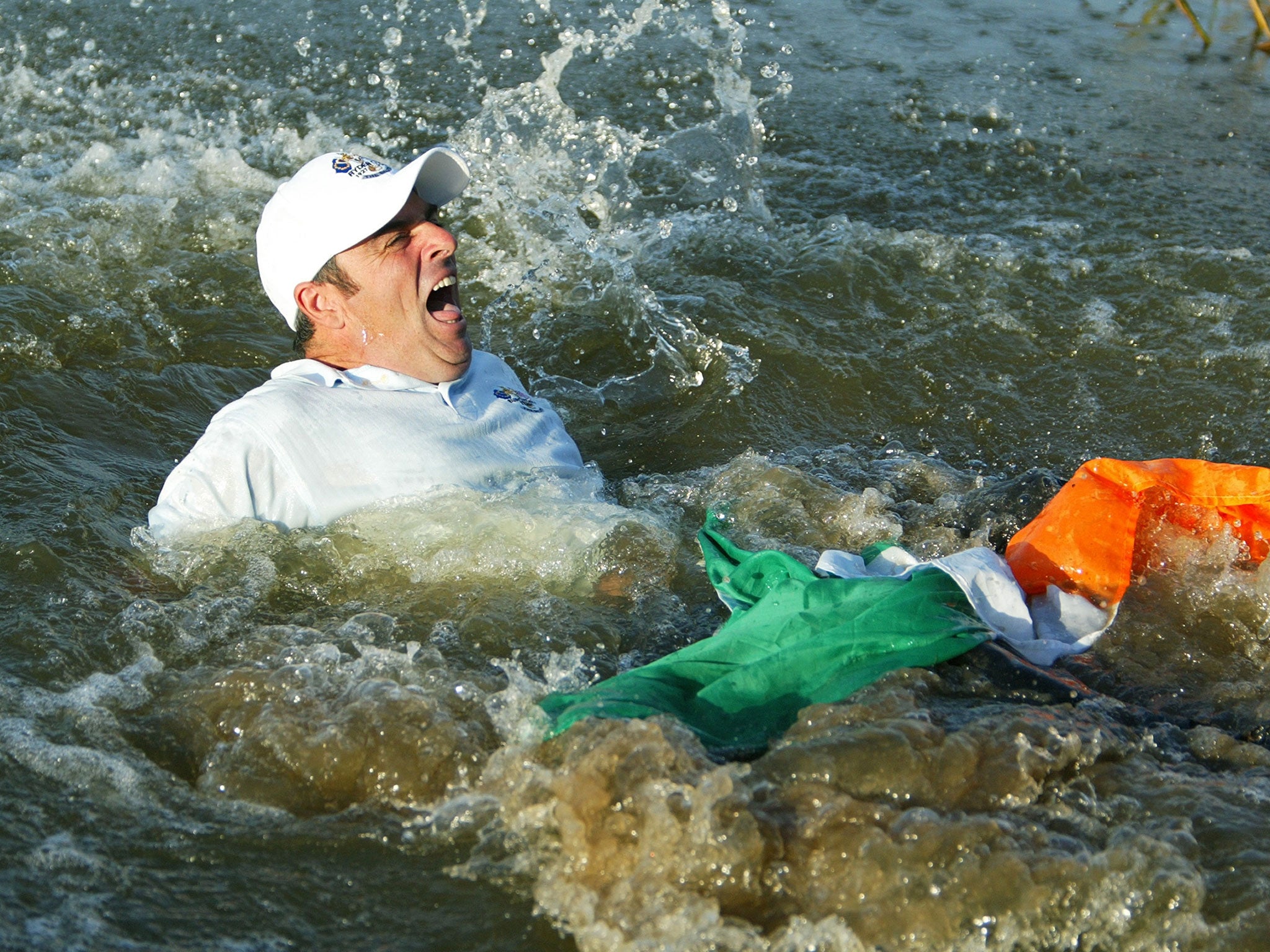 Paul McGinley is thrown into the lake at the Belfry in 2002 after holing the winning putt for the Ryder Cup