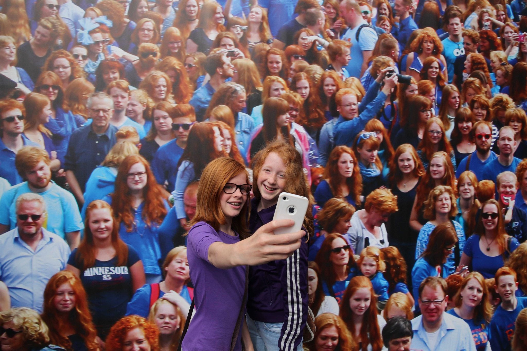 People with red hair enjoy themselves during the Redhead Day in Breda