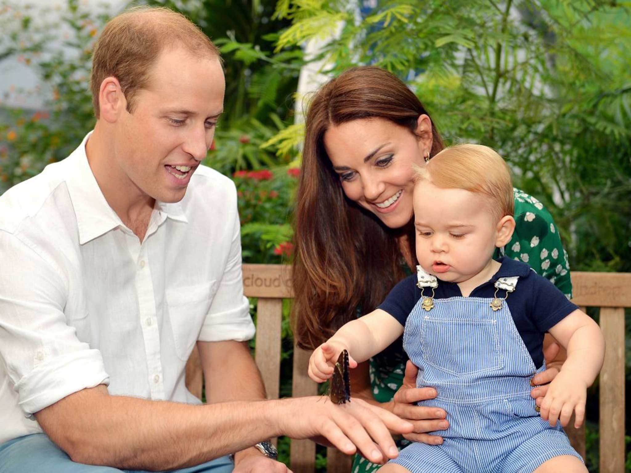 The Duke and Duchess of Cambridge with George - who will soon be a big brother