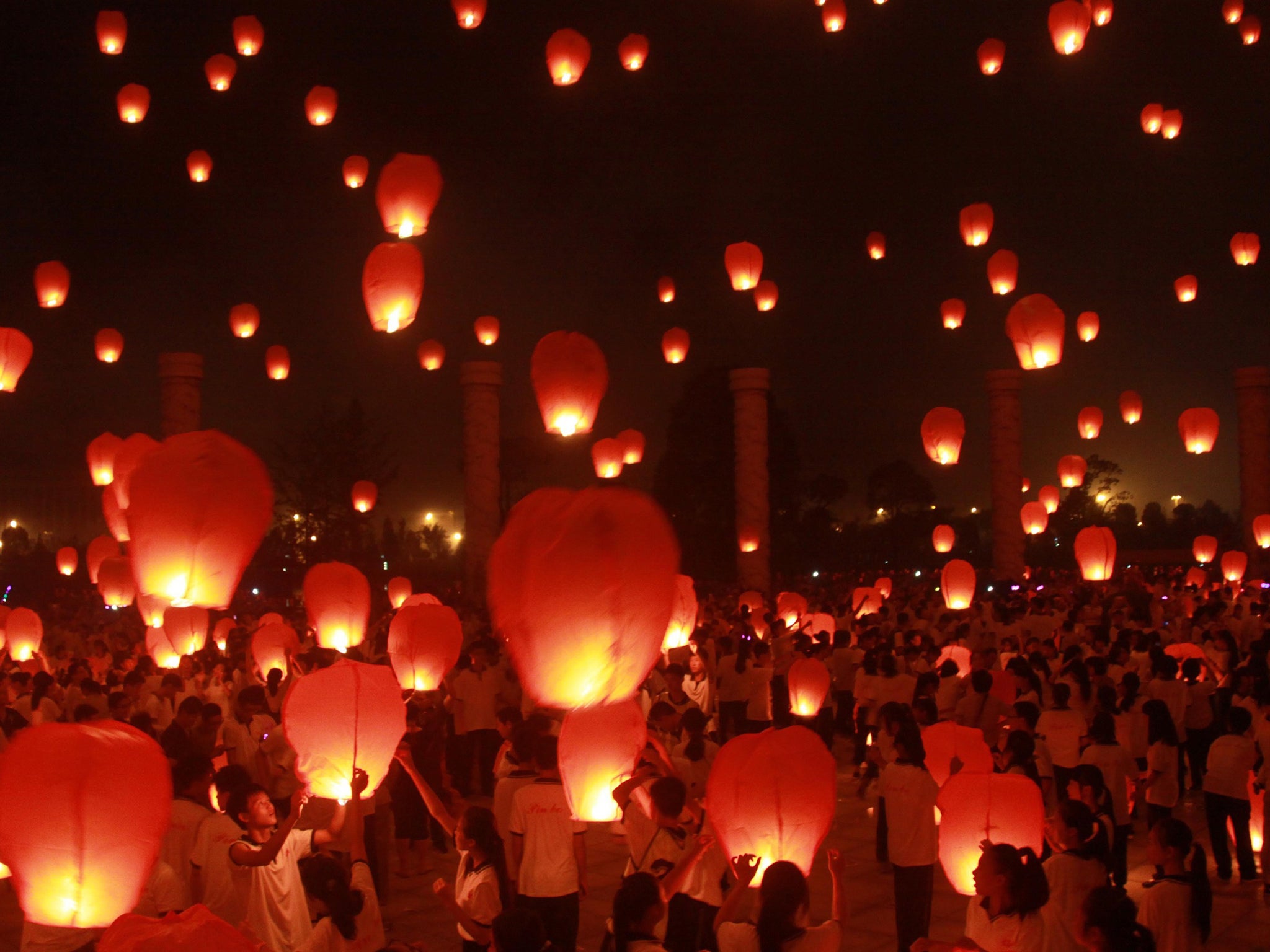 Many festival-goers will fly floating lanterns during the event in the belief it can ward off bad luck.