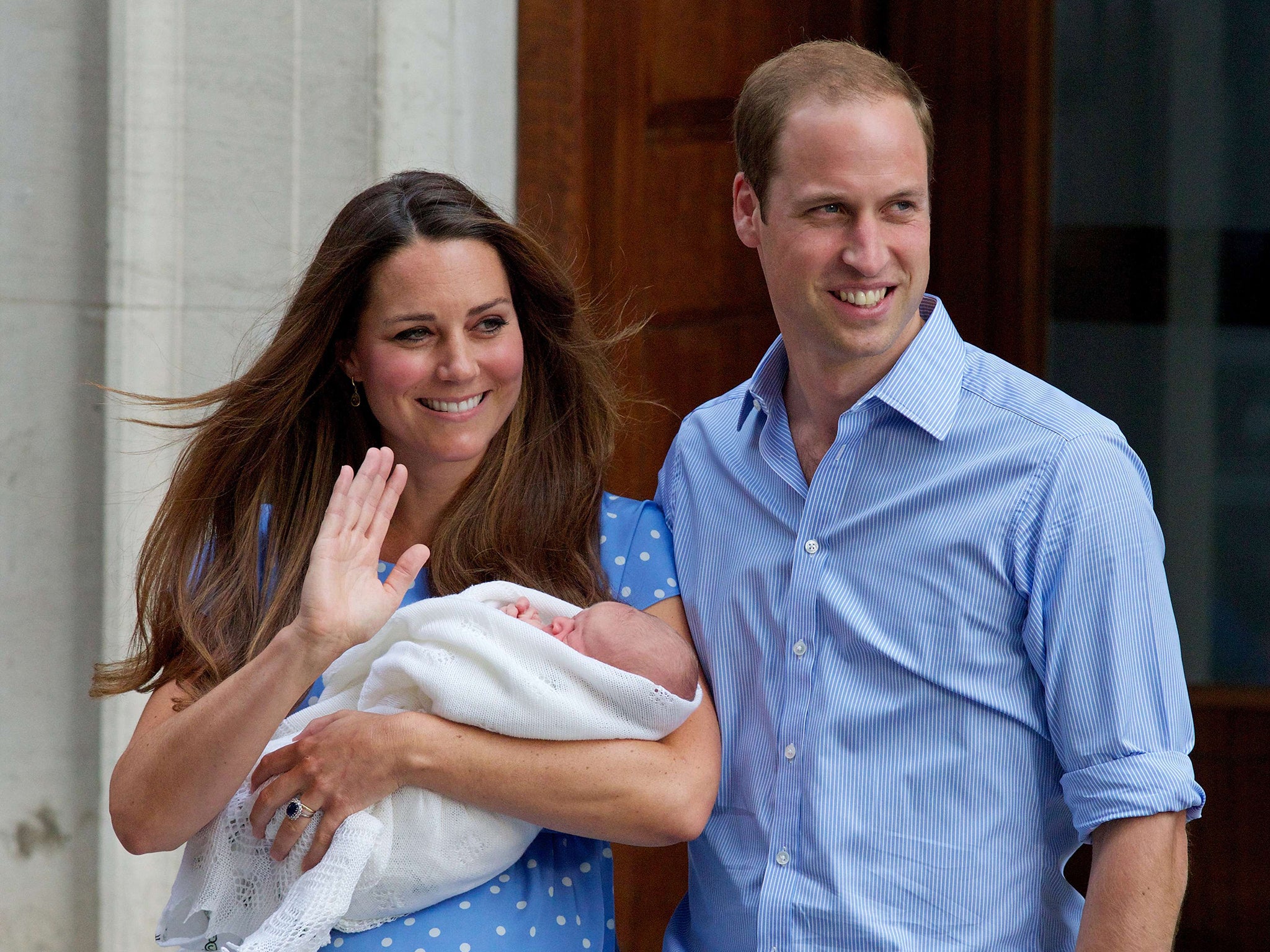 Prince William and Catherine, Duchess of Cambridge, posing for pictures on the birth of their first son Prince George St Mary's Hospital in London