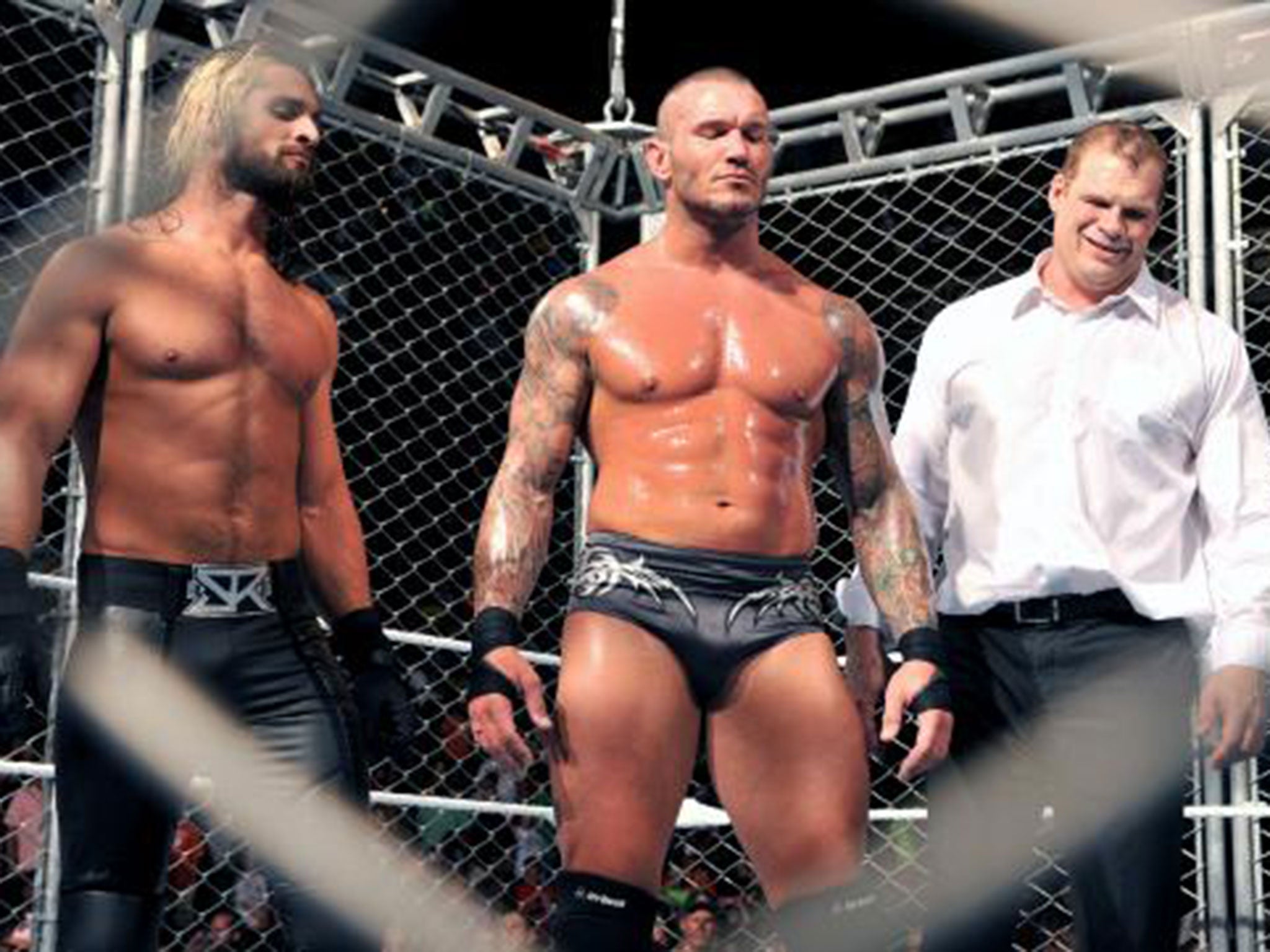 Seth Rollins, Randy Orton and Kane stand tall over Roman Reigns