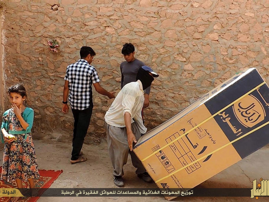 Isis militants claimed to give out fridges in Rutba