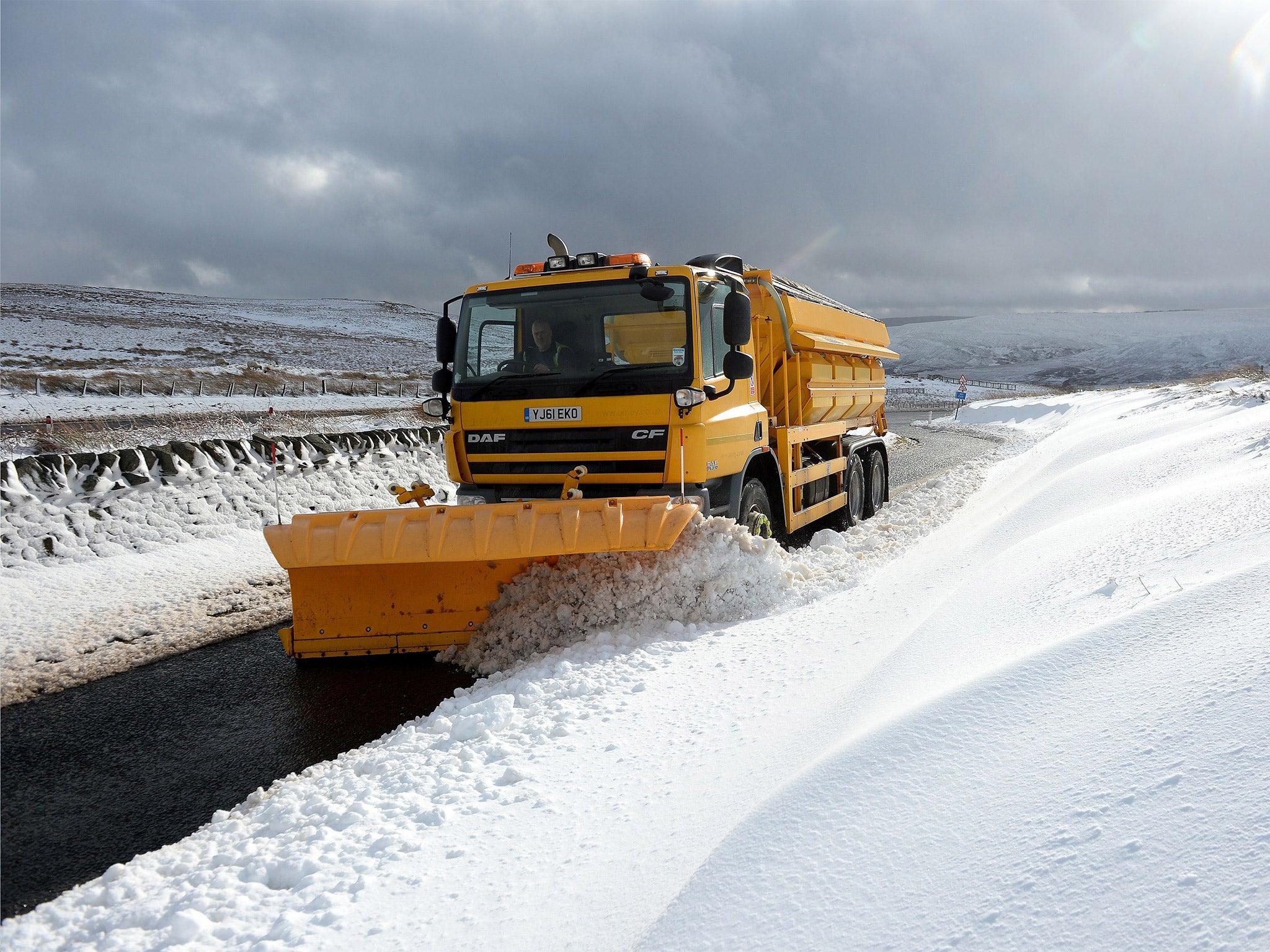 A snow plough clearing snow on the Northumberland border in February