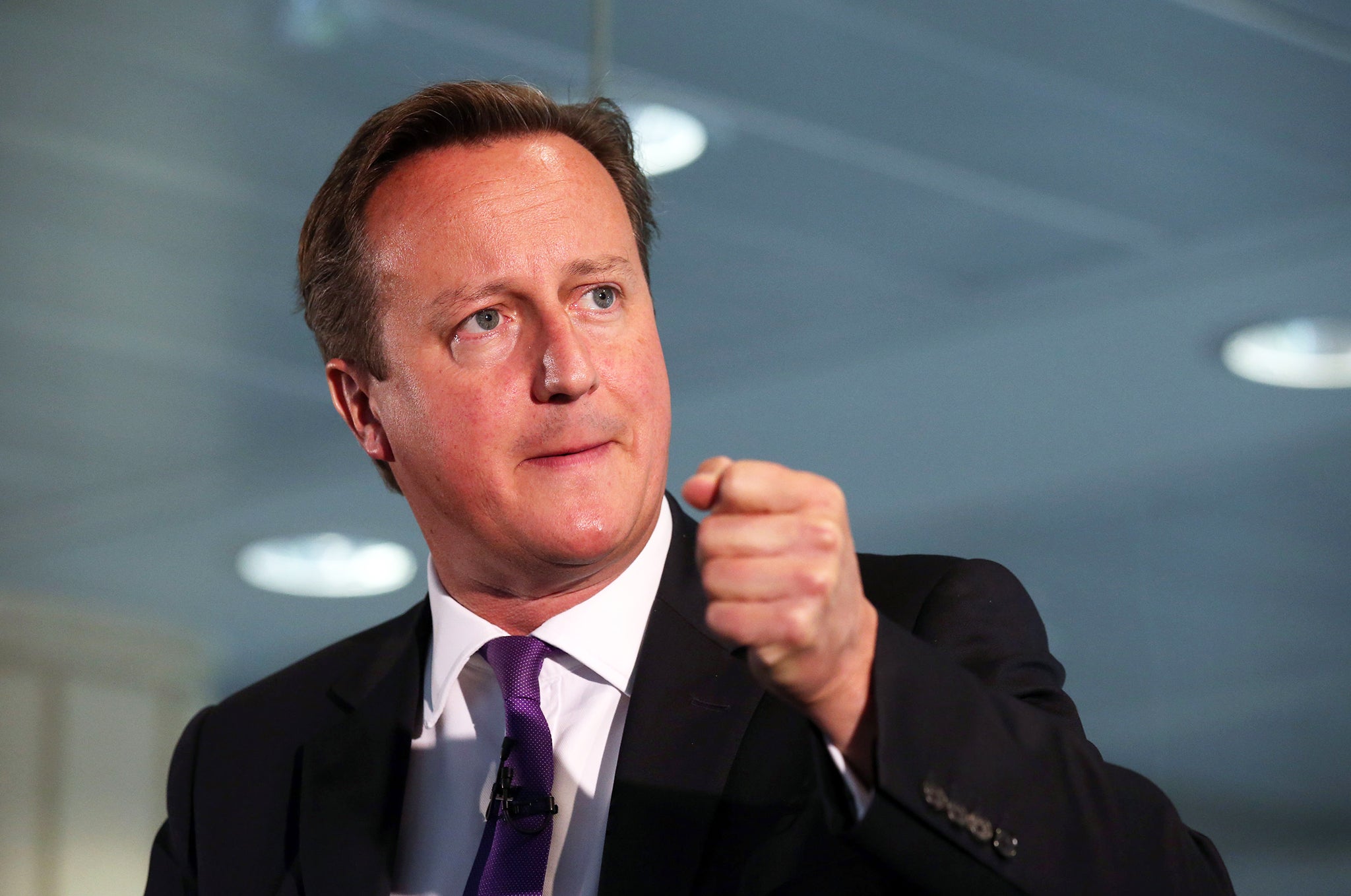 Prime Minister David Cameron speaks during a visit to Scottish Widows offices in Edinburgh, where he made an impassioned plea to keep Scotland part of the union, saying he would be "heartbroken" if the UK was torn apart