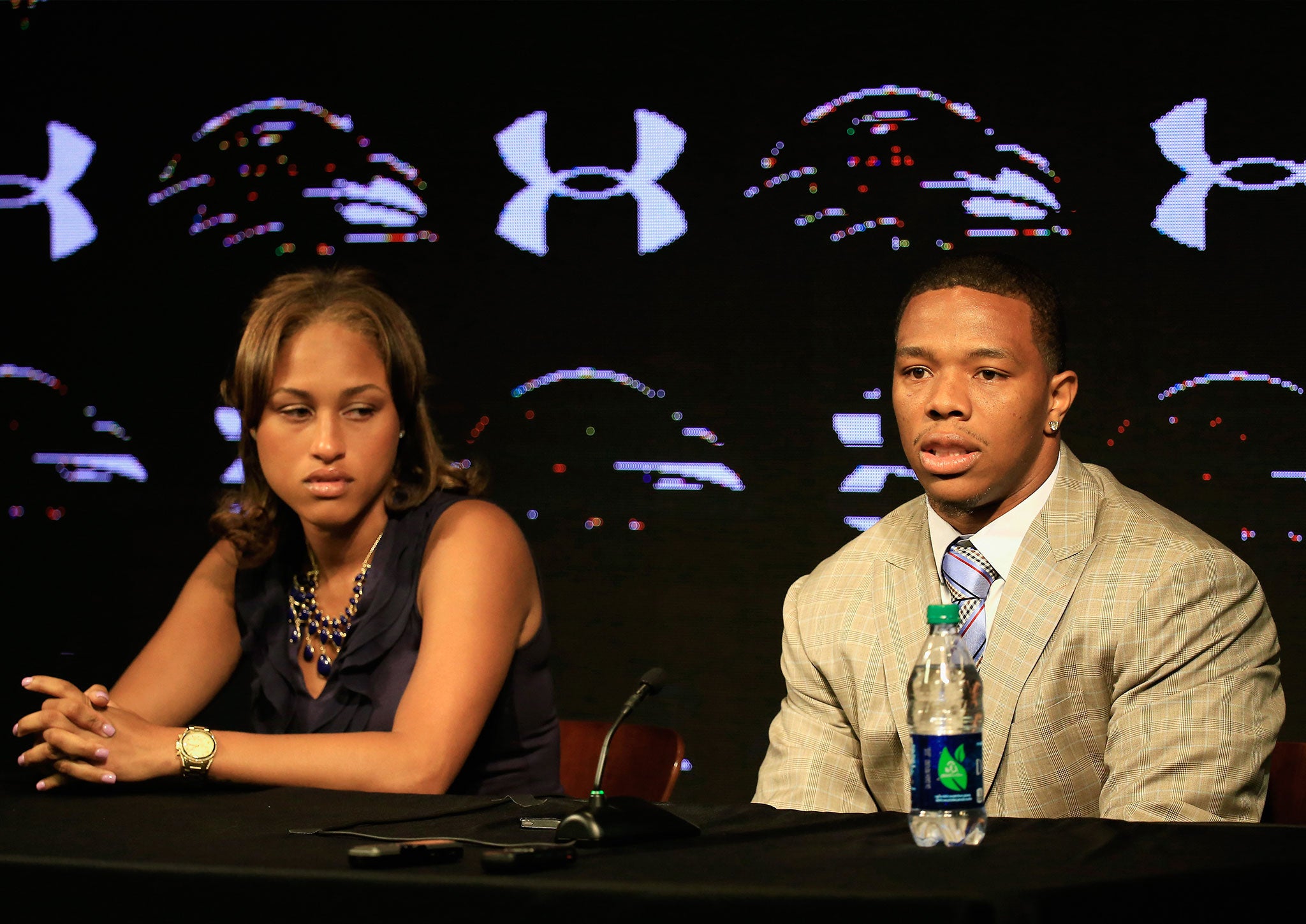 Running back Ray Rice of the Baltimore Ravens addresses a news conference with his wife Janay at the Ravens training center on May 23, 2014