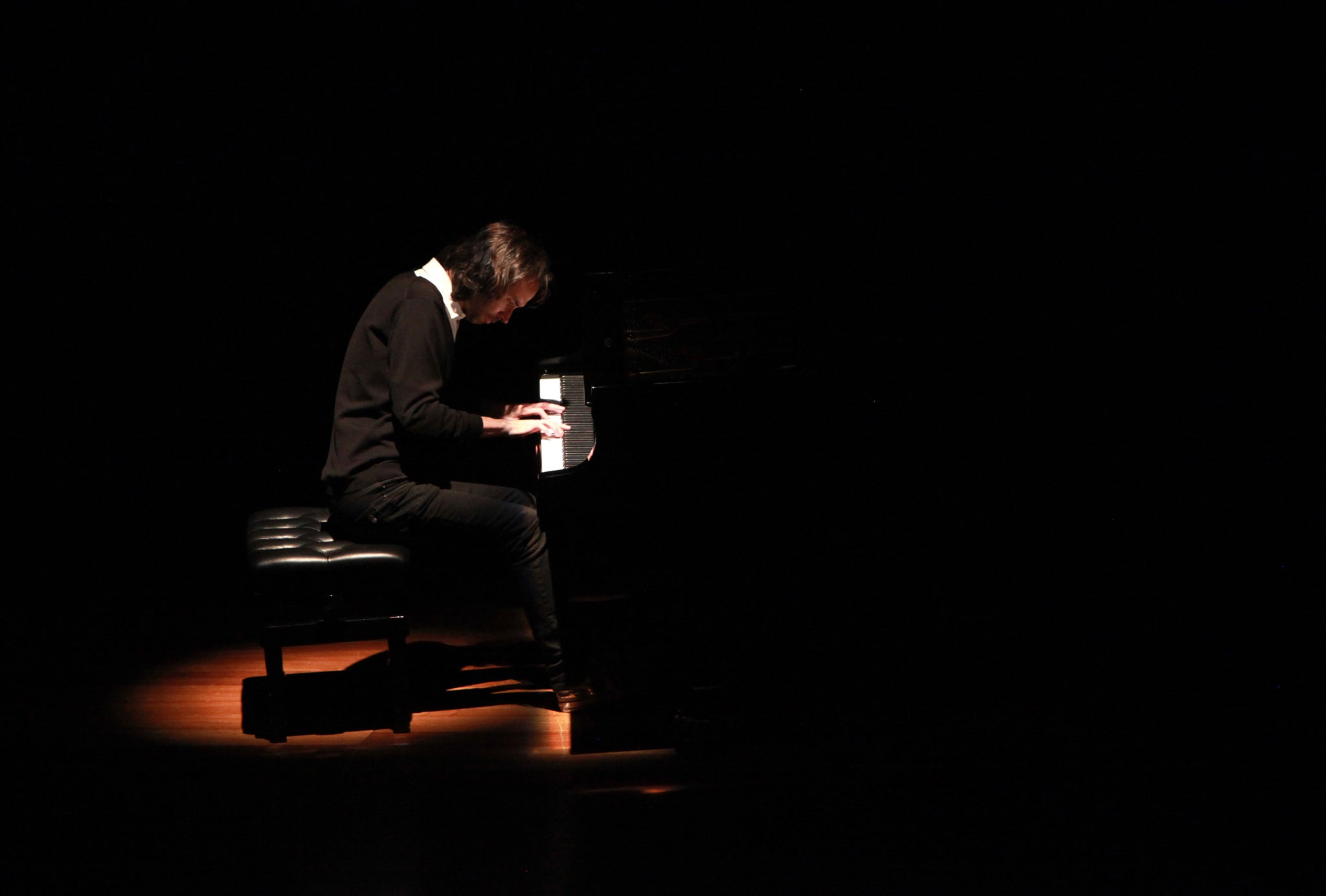 Pianist James Rhodes performs on stage in 2011