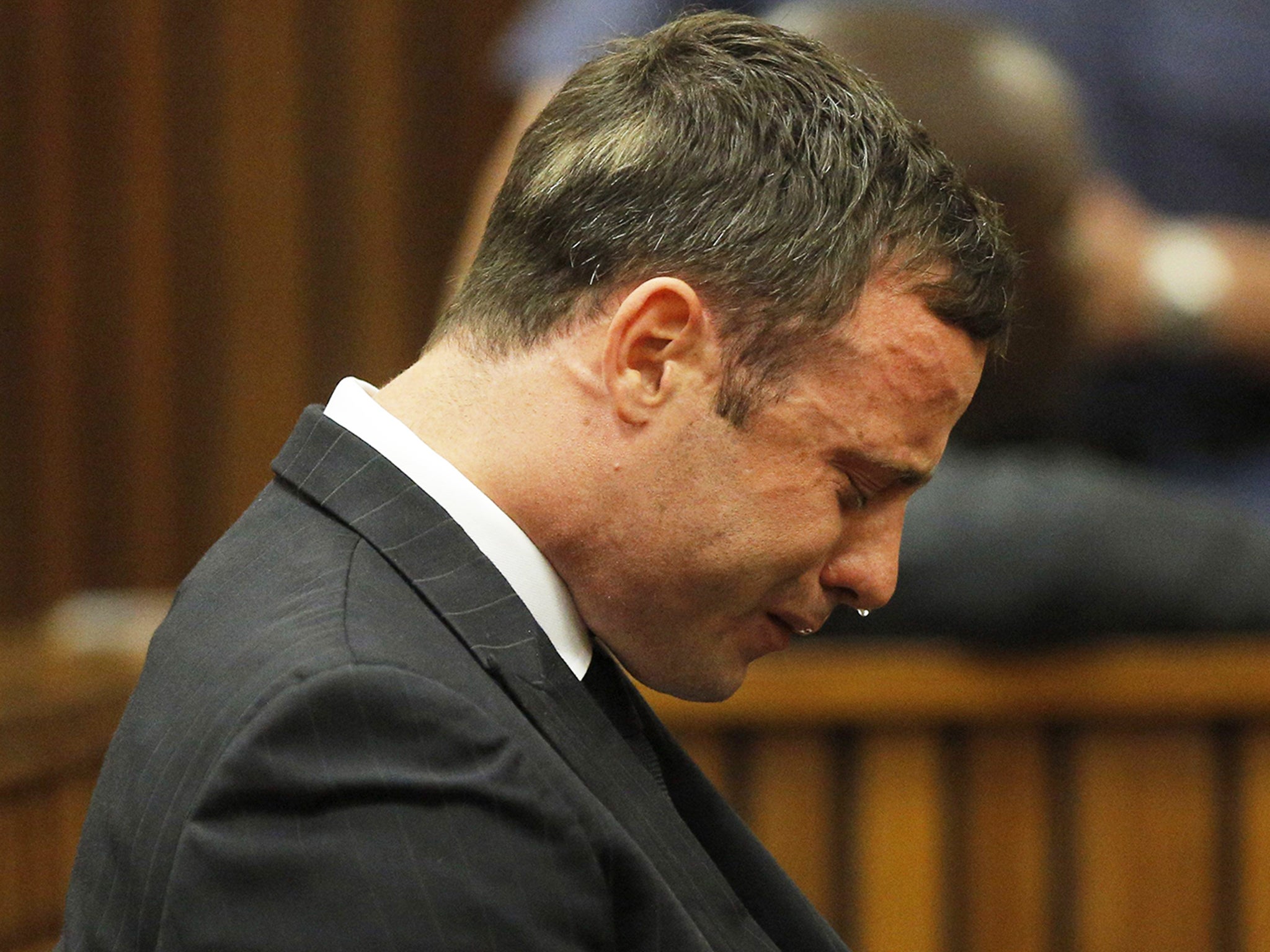 Oscar Pistorius cries as the judge reads out the verdict during his murder trial