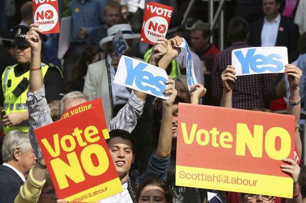 'Yes' campaign supporters try to disrupt a gathering of a 'No' campaign rally that Labour party leader Ed Miliband addressed
