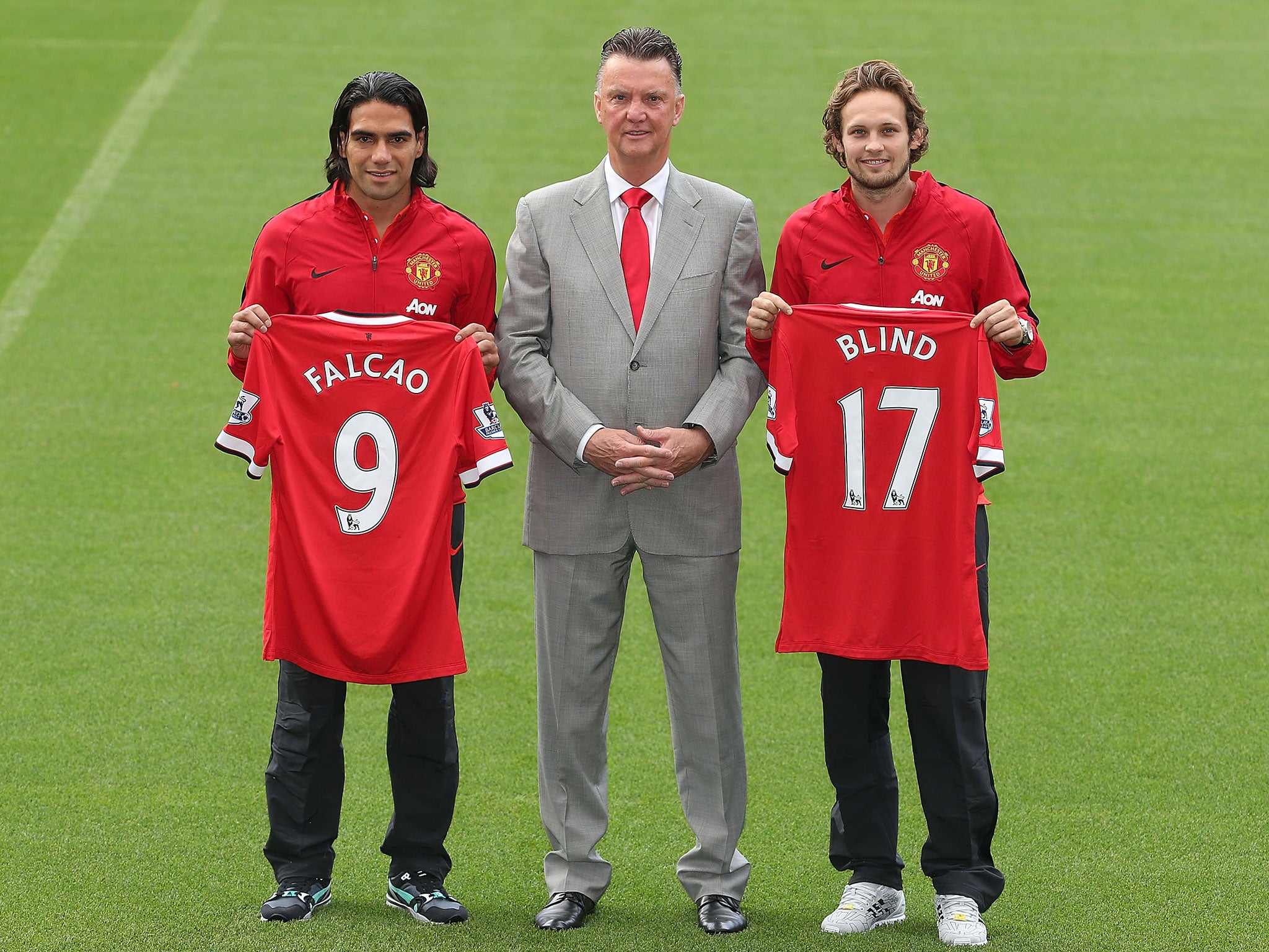 Radamel Falcao (left) and Daley Blind (right) unveiled alongside manager Louis van Gaal today