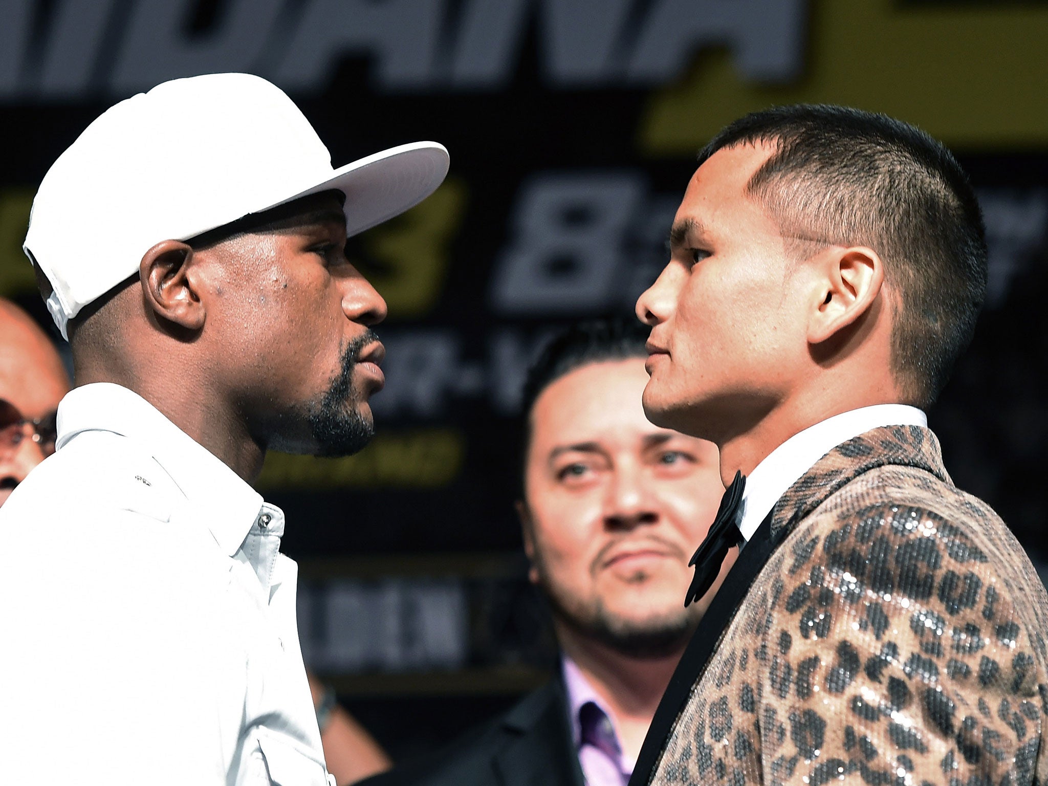 Floyd Mayweather (left) and Marcos Maidana square off this week during their press conference