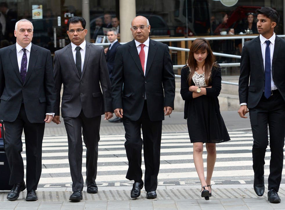 Benedict Barboza, second from left, the husband of Jacintha Saldanha, their children Lisha and Junal, right, and Keith Vaz MP, centre, arrive for the inquest