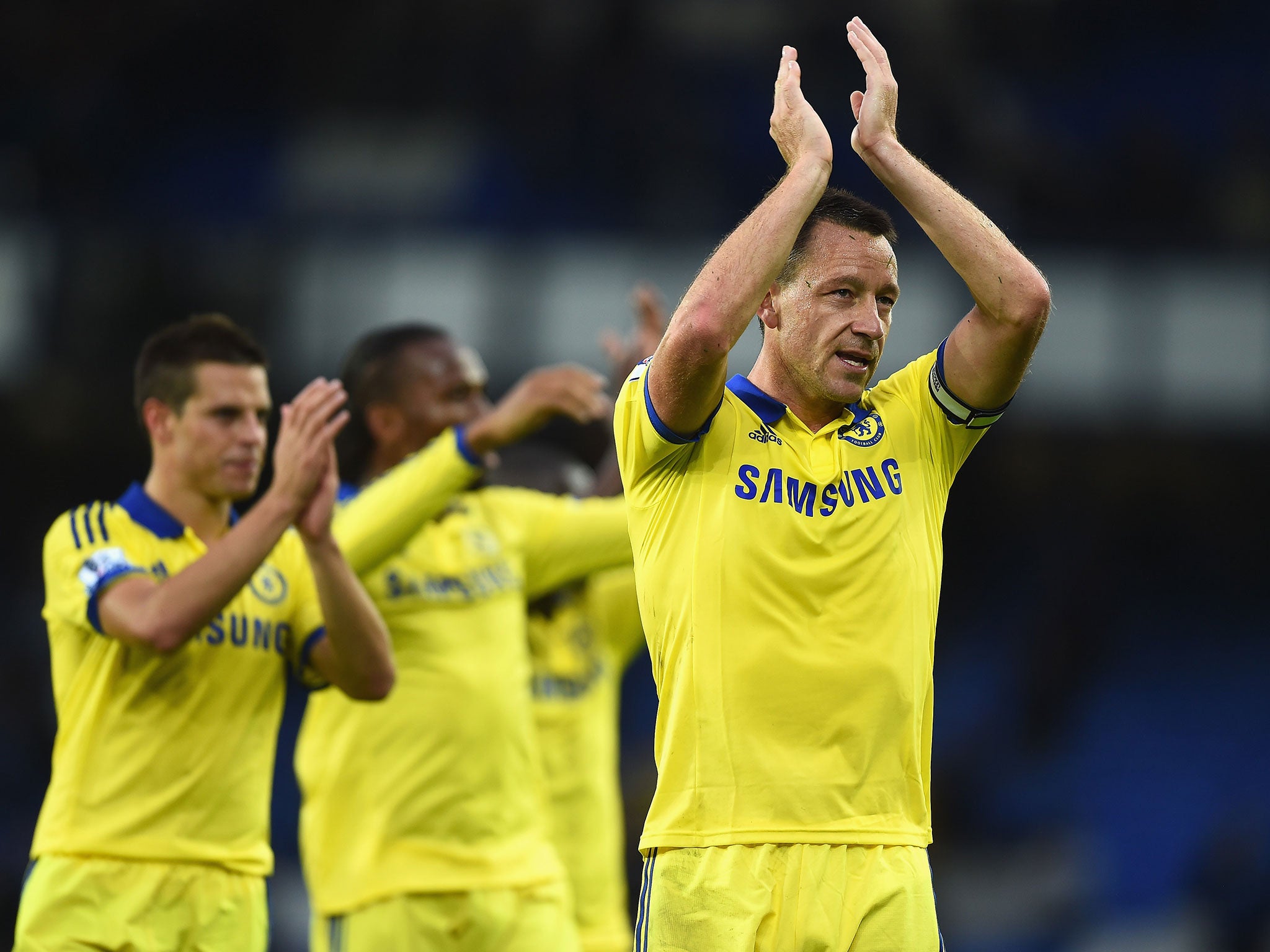 John Terry applauds the Chelsea fans after their 6-3 win at Everton