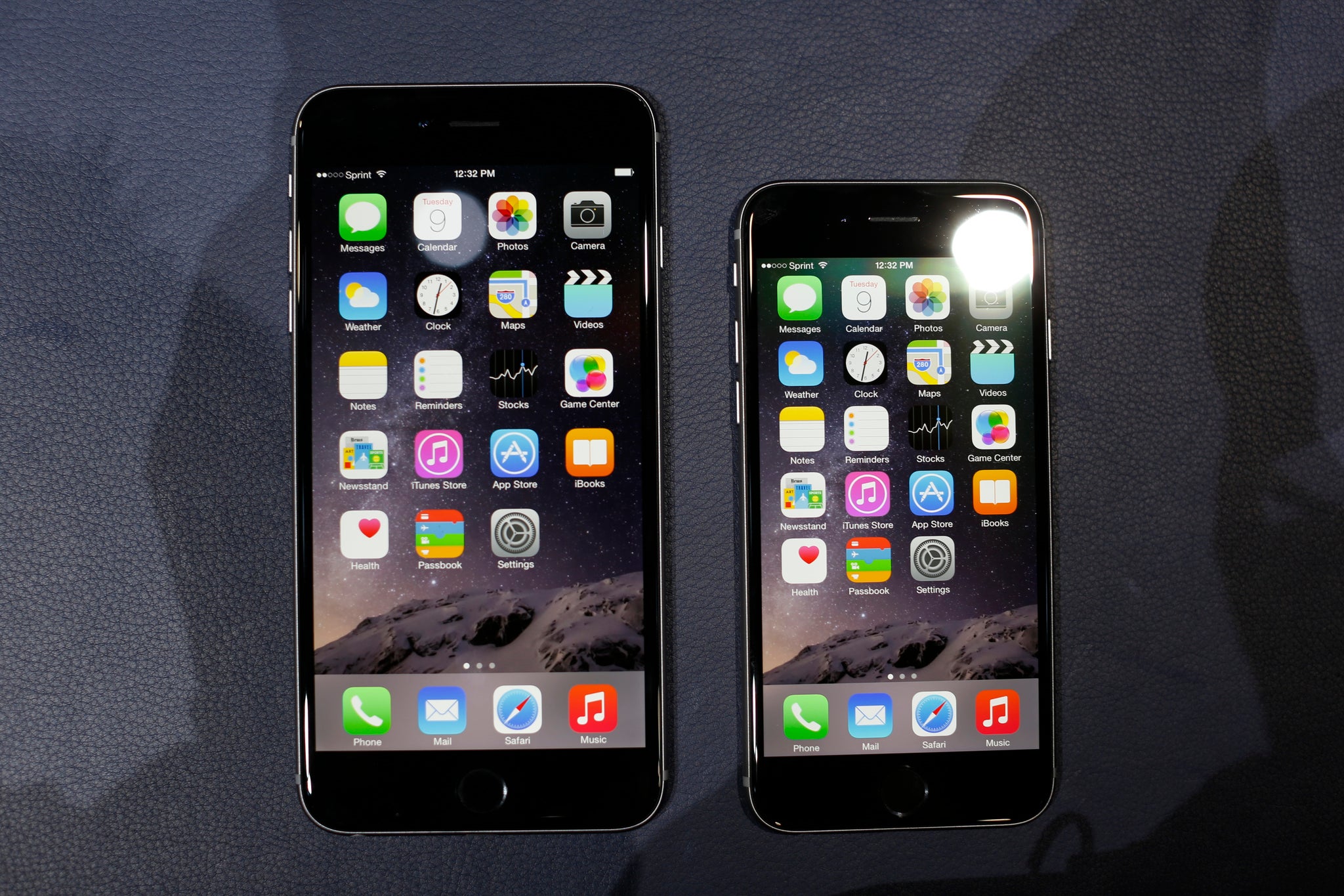 The Apple iPhone 6 (right) and the bigger, iPhone 6 Plus
