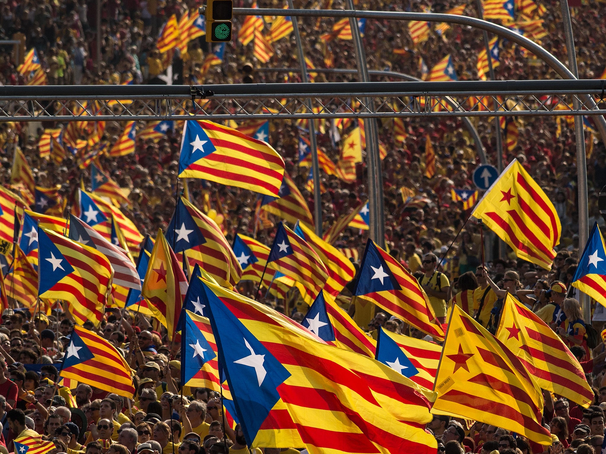 Demonstrators march during a Pro-Independence demonstration as part of the celebrations of the National Day of Catalonia in Barcelona