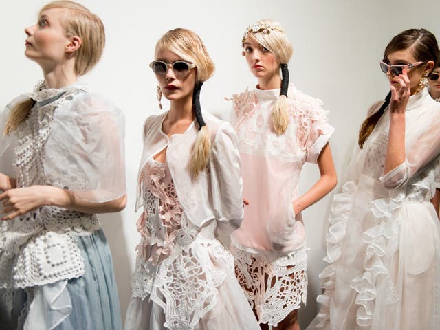 Models backstage at the Bora Aksu show in 2014