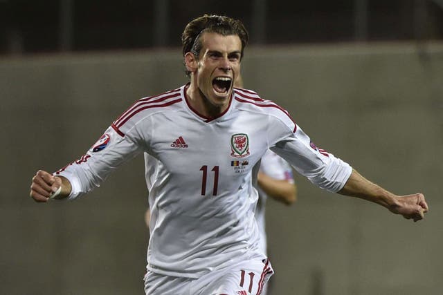 Gareth Bale celebrates his brilliant free-kick winner for Wales against Andorra on Tuesday