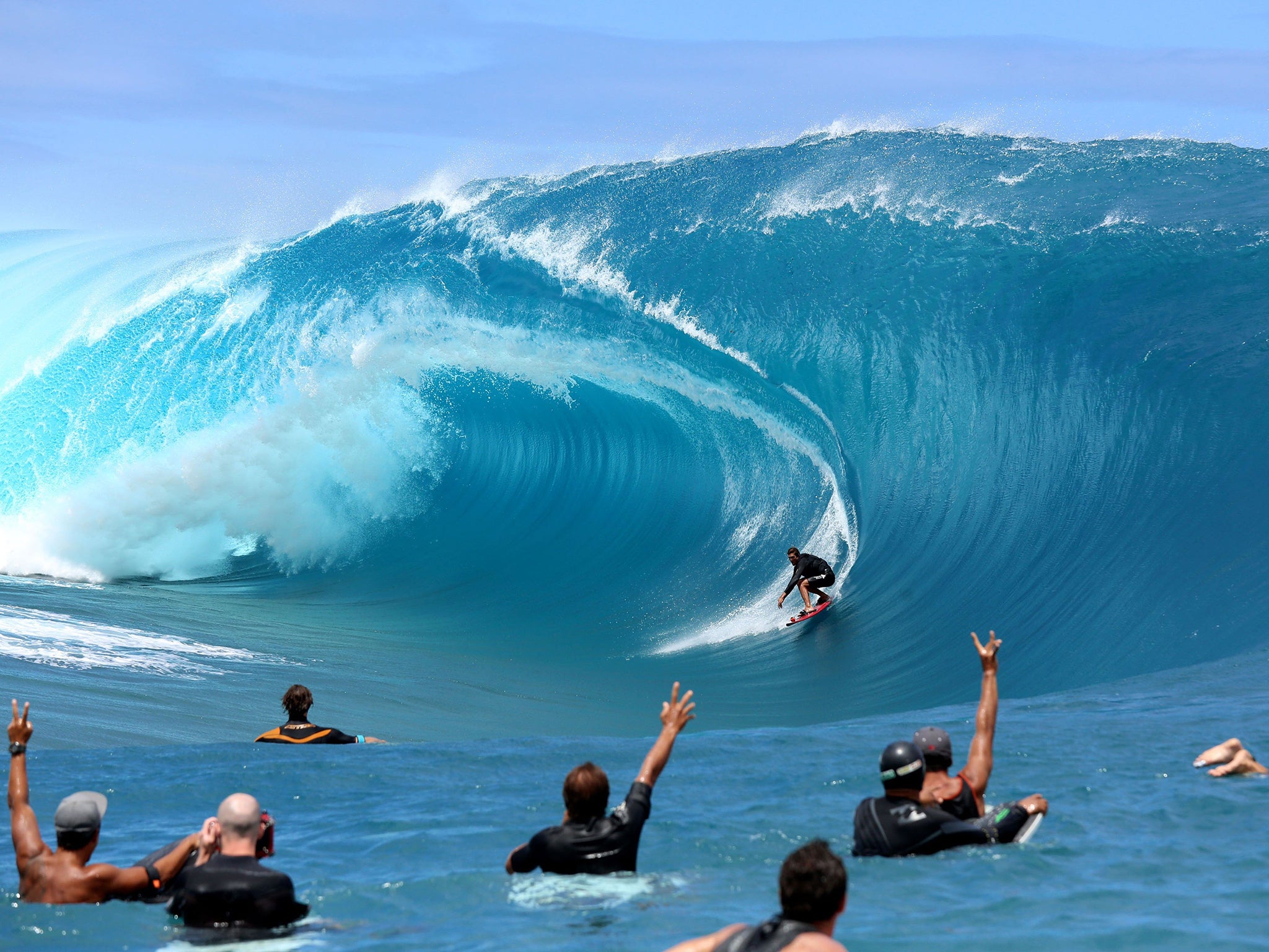 Takanui Smith rides a wave
