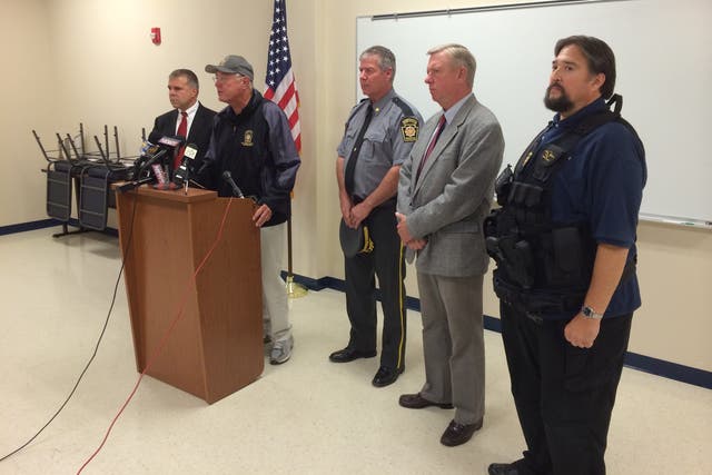 State police Commissioner Frank Noonan, addresses the media after two troopers were ambushed outside a state police barracks in northeastern Pennsylvania.   
