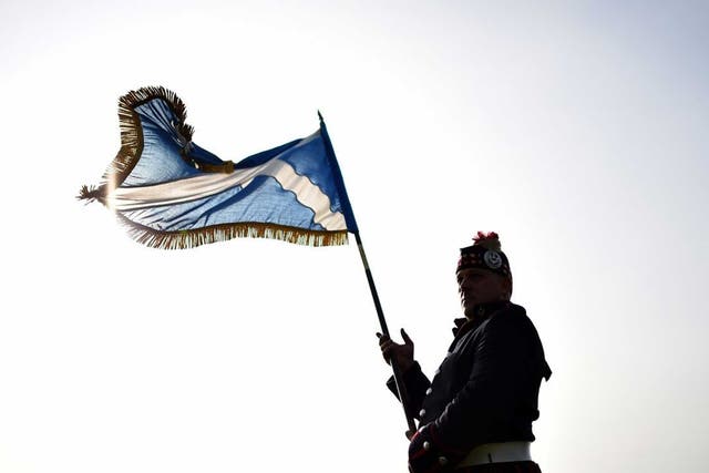 A lone Scotsman flies the Saltire