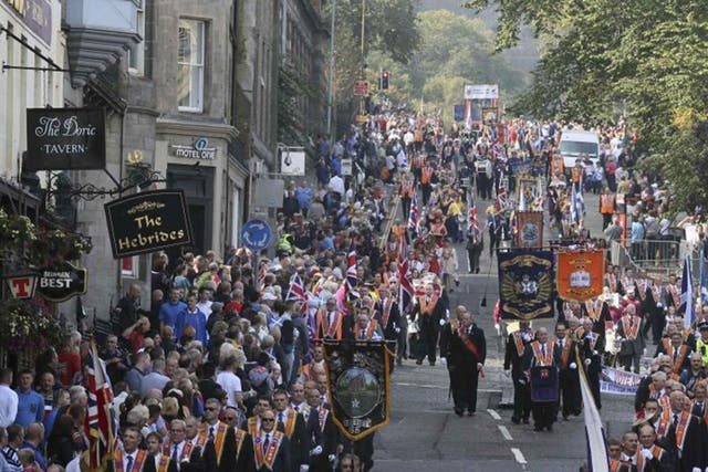 Members of the Orange Order march through Edinburgh