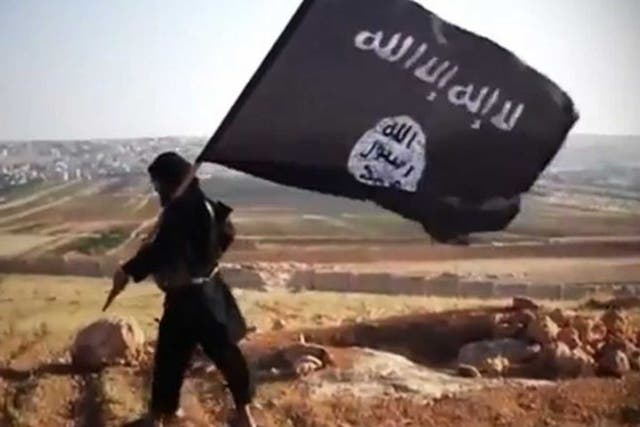 The jihadi flag of the Islamic State (IS)