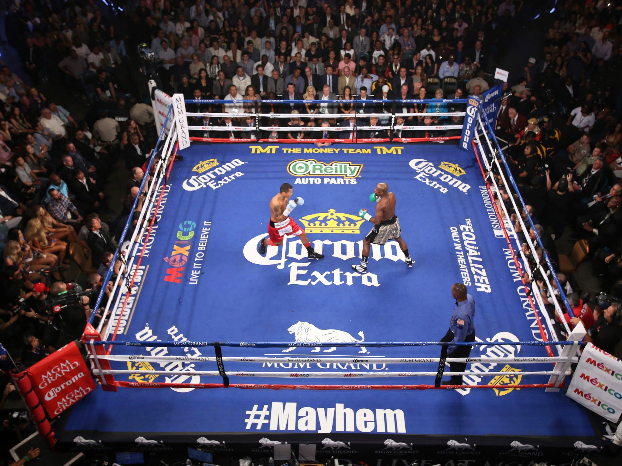 Marcos Maidana and welterweight champion Floyd Mayweather square off during their title fight