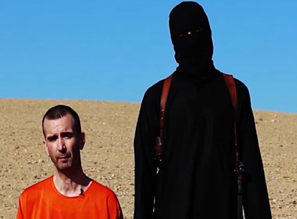 The Islamic State (Isis) has released a video puporting to show the beheading of the British hostage and aid worker David Haines. The video shows Mr Haines, who was captured by militants in Syria in 2013, wearing an orange jumpsuit and kneeling in the des
