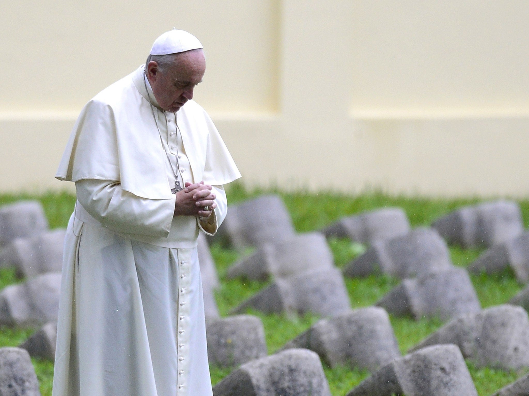 Pope Francis prays in the military cemetary of the World War I memorial of Redipuglia, near Gorizia, northern Italy