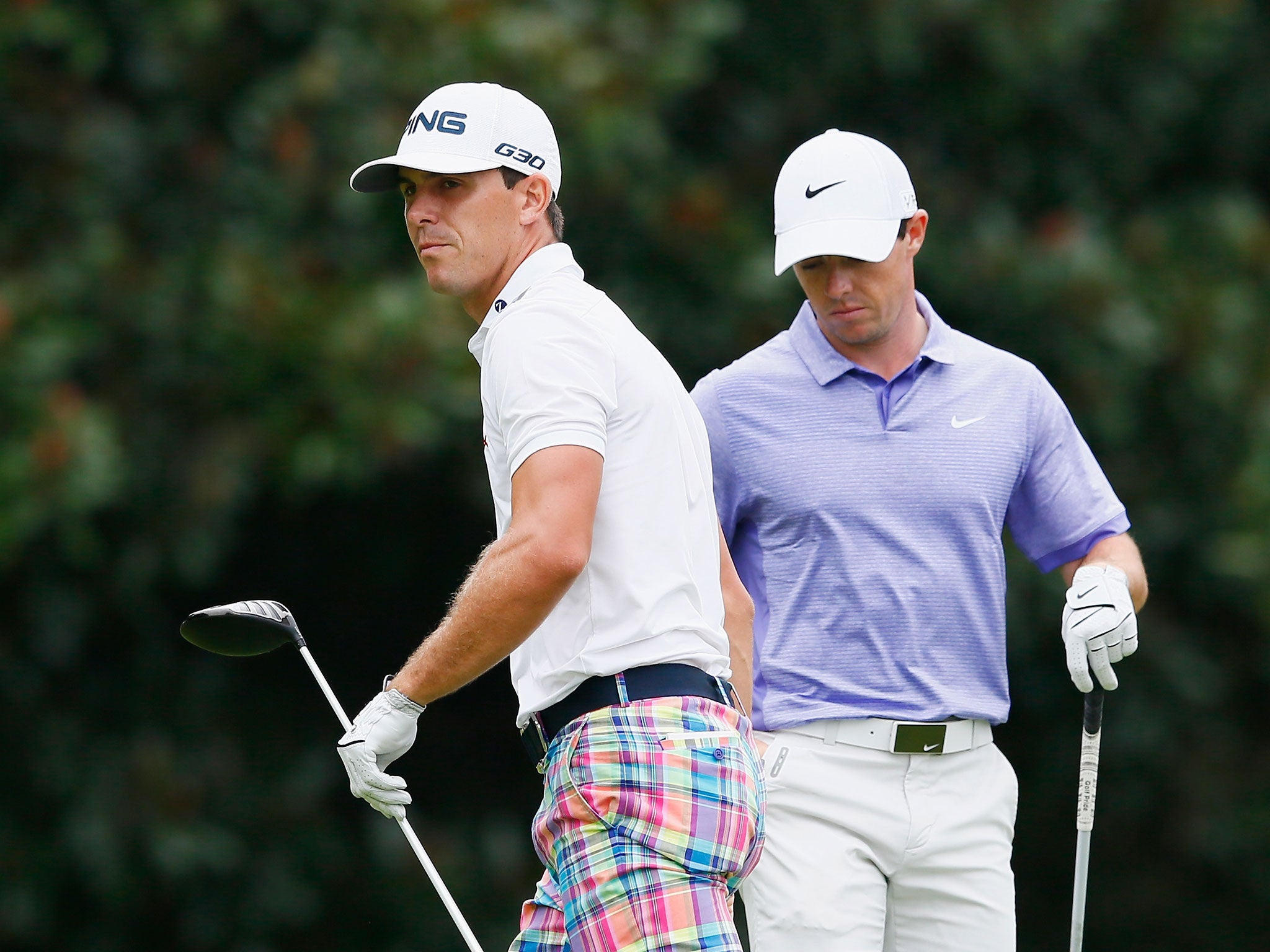 Billy Horschel (left) and Rory McIlroy at the Tour Championship on Sunday